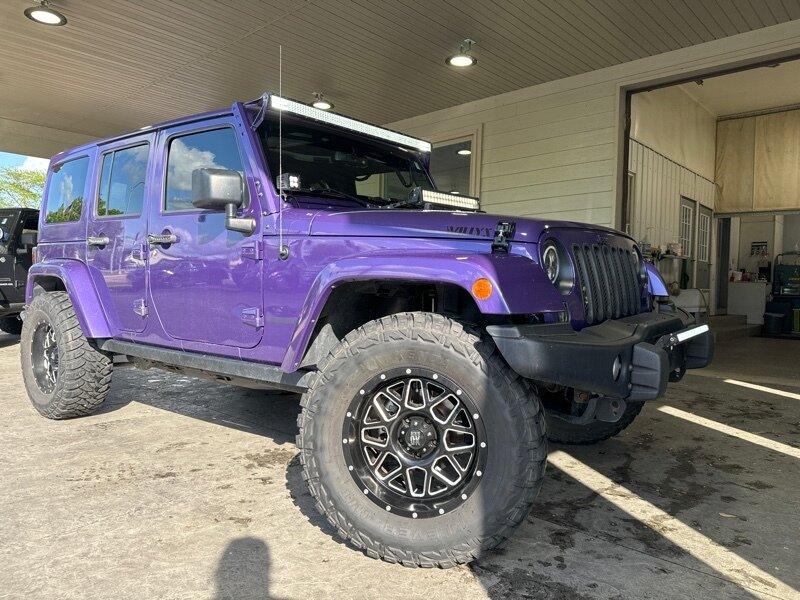 photo of 2016 Jeep Wrangler Unlimited Sahara Back Country SUV