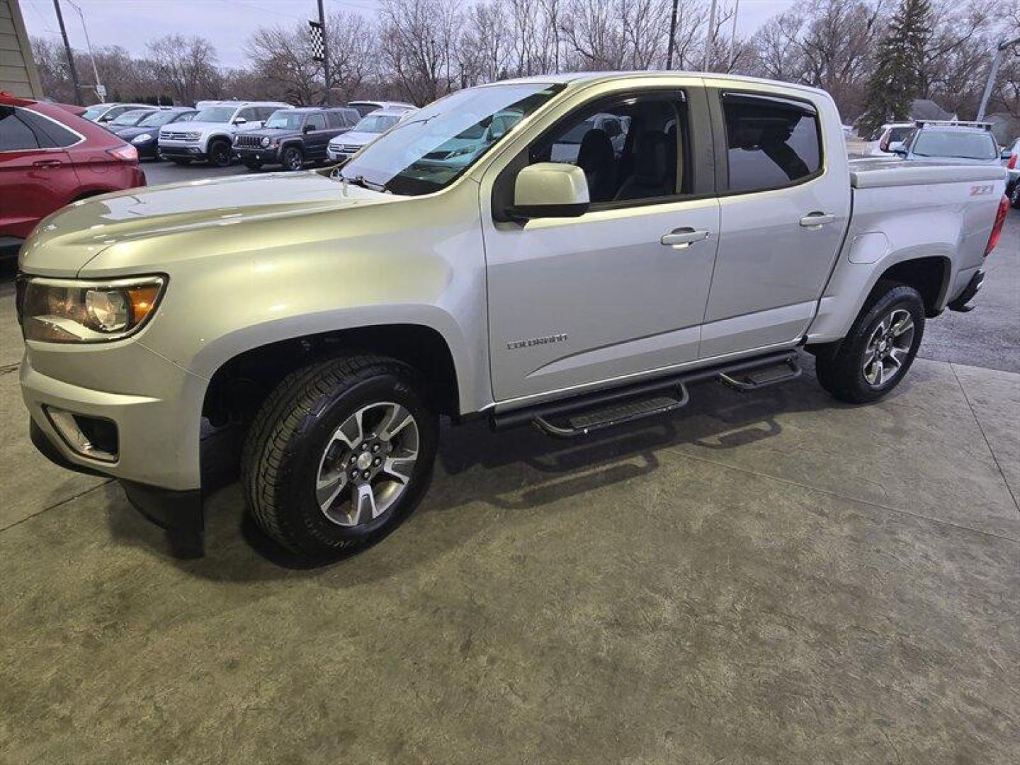 2015 Silver Ice Metallic /Black Chevrolet Colorado Z71 (1GCGTCE39F1) with an 3.6 engine, Automatic transmission, located at 25355 Eames Street, Channahon, IL, 60410, (815) 467-1807, 41.429108, -88.228432 - Introducing the 2015 Chevrolet Colorado Z71, a powerful and versatile pickup truck that boasts a 3.6-liter V6 engine. With its impressive performance and sleek design, this vehicle is perfect for those who demand both power and style. From the factory, the Colorado Z71 comes with a host of feature - Photo#7