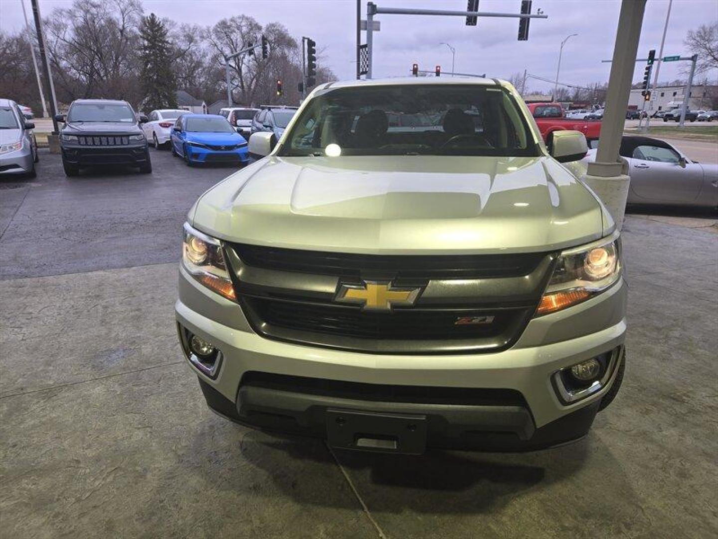 2015 Silver Ice Metallic /Black Chevrolet Colorado Z71 (1GCGTCE39F1) with an 3.6 engine, Automatic transmission, located at 25355 Eames Street, Channahon, IL, 60410, (815) 467-1807, 41.429108, -88.228432 - Introducing the 2015 Chevrolet Colorado Z71, a powerful and versatile pickup truck that boasts a 3.6-liter V6 engine. With its impressive performance and sleek design, this vehicle is perfect for those who demand both power and style. From the factory, the Colorado Z71 comes with a host of feature - Photo#8