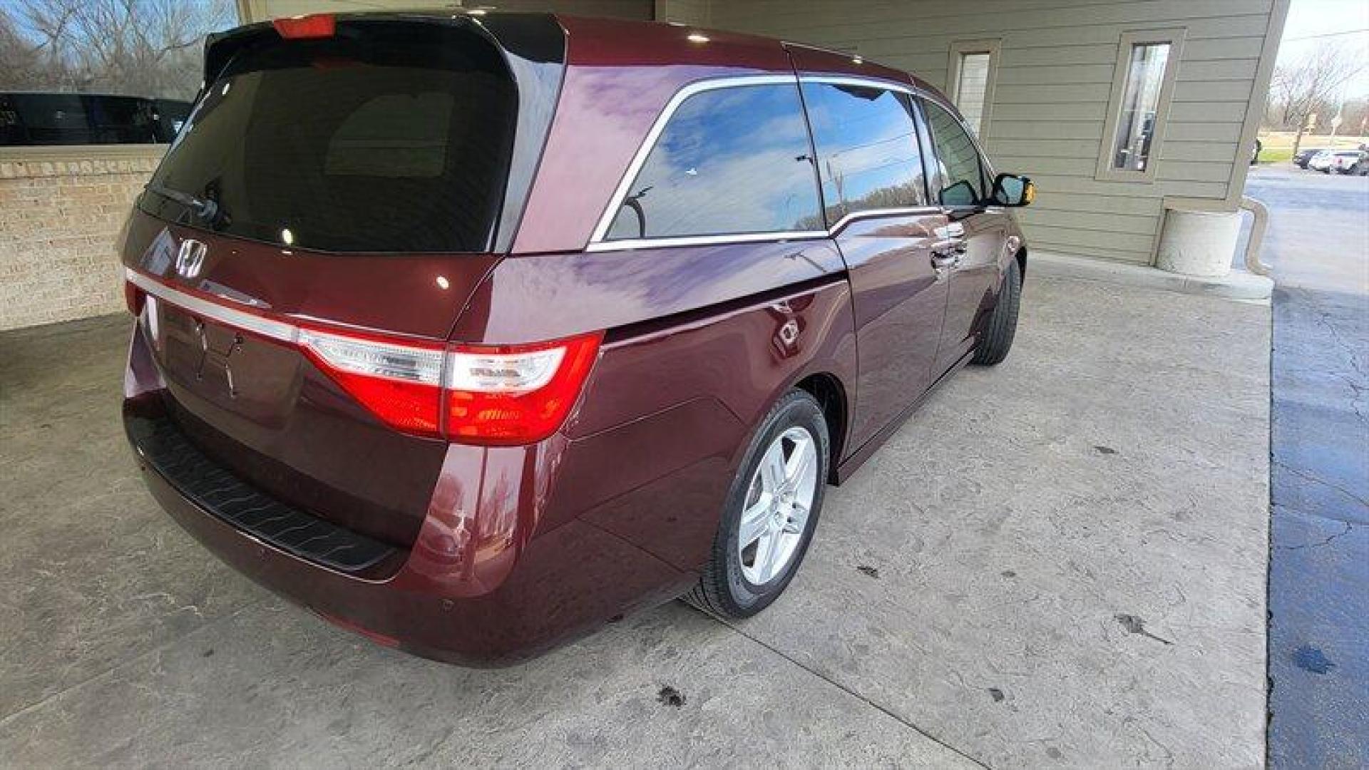 2013 Dark Cherry Pearl Honda Odyssey Touring (5FNRL5H98DB) with an 3.5L V6 248hp 250ft. engine, Automatic transmission, located at 25355 Eames Street, Channahon, IL, 60410, (815) 467-1807, 41.429108, -88.228432 - Introducing the 2013 Honda Odyssey Touring, a luxurious and reliable minivan that's perfect for families on the go. Powered by a 3.5L V6 engine that delivers an impressive 248 horsepower and 250 ft.-lb. of torque, this vehicle is a joy to drive. With less than 69,000 miles on the odometer, this Hon - Photo#6