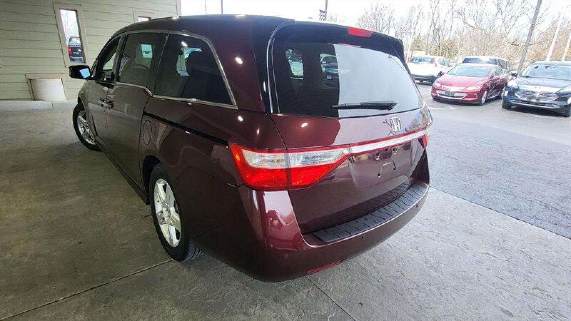 2013 Dark Cherry Pearl Honda Odyssey Touring (5FNRL5H98DB) with an 3.5L V6 248hp 250ft. engine, Automatic transmission, located at 25355 Eames Street, Channahon, IL, 60410, (815) 467-1807, 41.429108, -88.228432 - Introducing the 2013 Honda Odyssey Touring, a luxurious and reliable minivan that's perfect for families on the go. Powered by a 3.5L V6 engine that delivers an impressive 248 horsepower and 250 ft.-lb. of torque, this vehicle is a joy to drive. With less than 69,000 miles on the odometer, this Hon - Photo#8