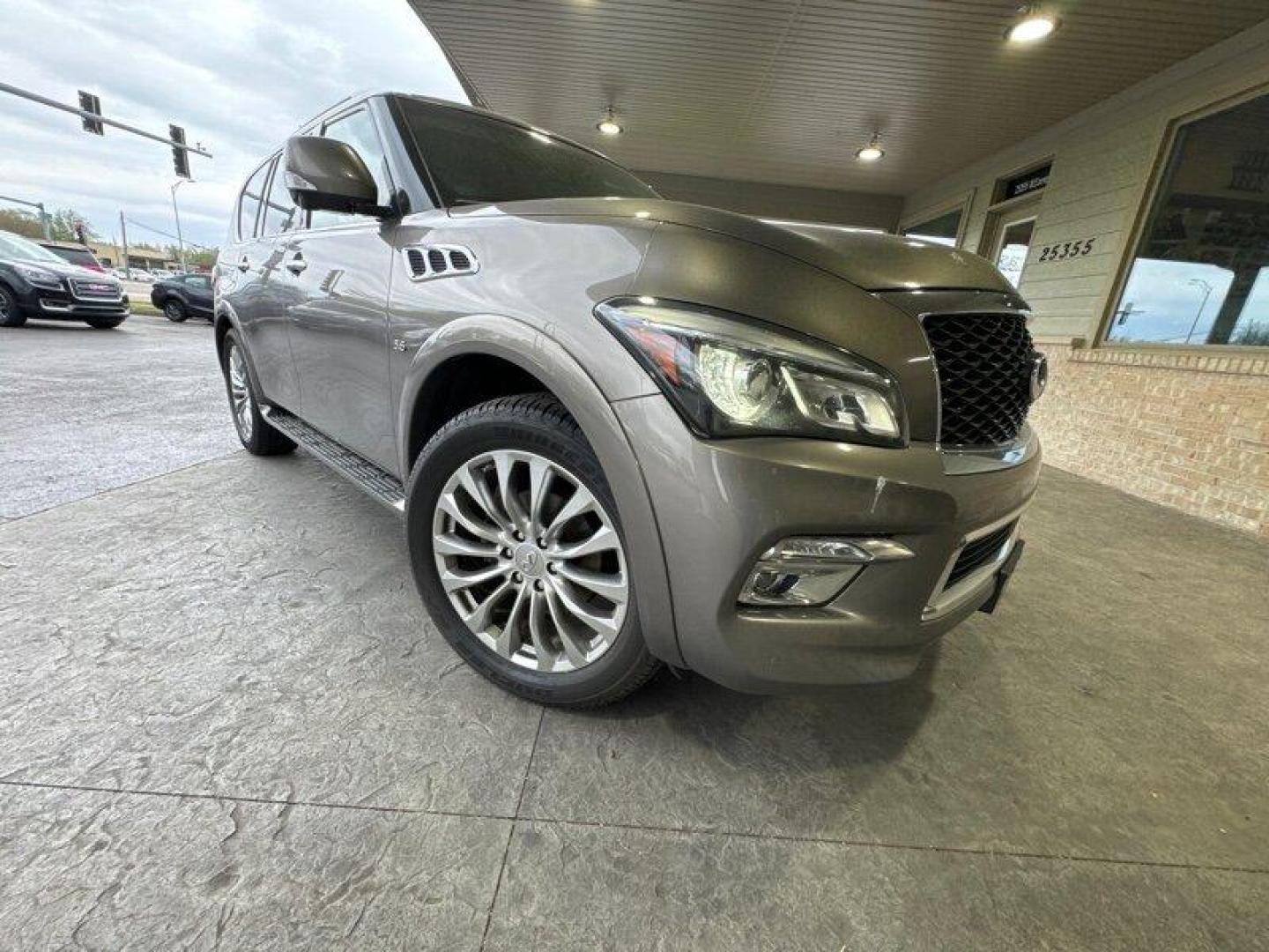 2015 Dark Currant Infiniti QX80 (JN8AZ2NE4F9) with an 5.6L V8 400hp 413ft. engine, Automatic transmission, located at 25355 Eames Street, Channahon, IL, 60410, (815) 467-1807, 41.429108, -88.228432 - Photo#0