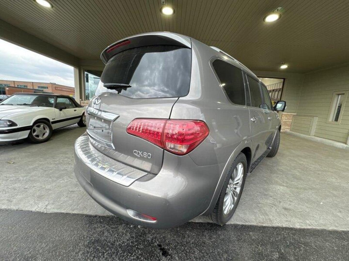 2015 Dark Currant Infiniti QX80 (JN8AZ2NE4F9) with an 5.6L V8 400hp 413ft. engine, Automatic transmission, located at 25355 Eames Street, Channahon, IL, 60410, (815) 467-1807, 41.429108, -88.228432 - Photo#3