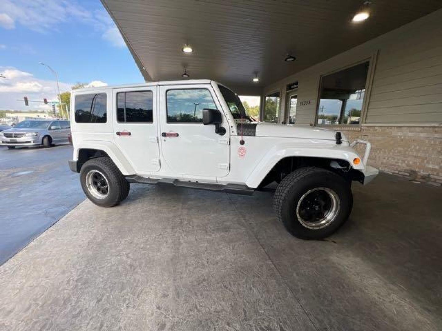 2017 Bright White Clear Coat Jeep Wrangler Unlimited Sahara (1C4HJWEG6HL) with an 3.6L V6 285hp 260ft. lbs. engine, Automatic transmission, located at 25355 Eames Street, Channahon, IL, 60410, (815) 467-1807, 41.429108, -88.228432 - CLEAN LOW MILE LOADED SAHARA! HEATED LEATHER! HARD TOP! If you're ready for a different, no hassle and pleasant car buying experience, then give us a chance! We're breaking the standard Car Sales mold and making one of our very own you'll be sure to appreciate! So, why buy from Crase Auto Connectio - Photo#2