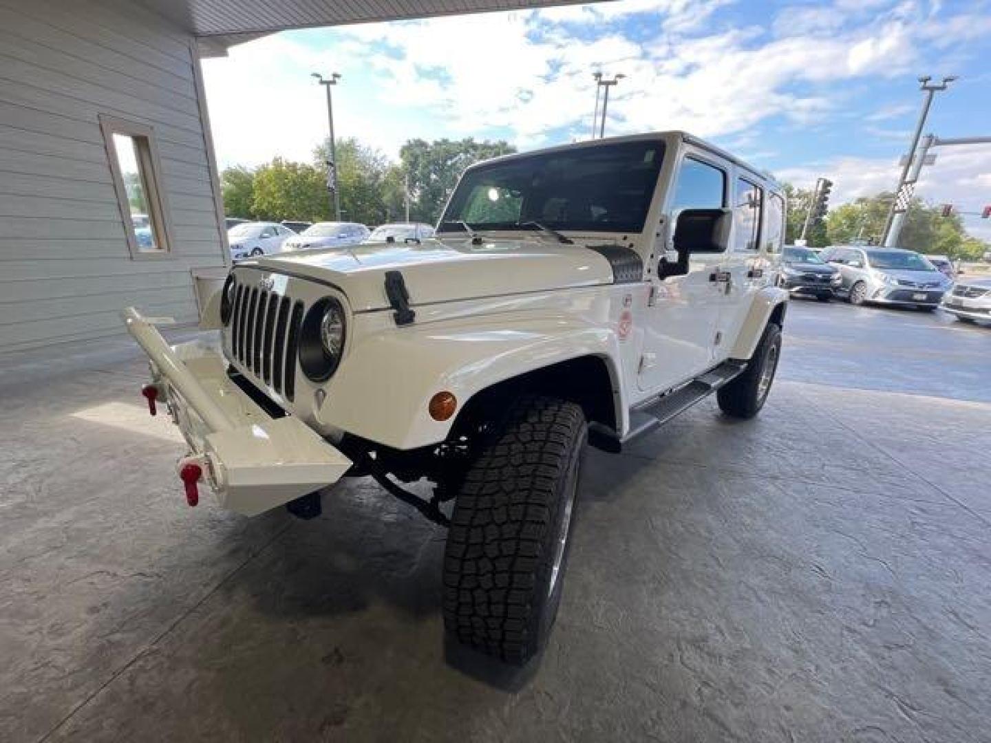 2017 Bright White Clear Coat Jeep Wrangler Unlimited Sahara (1C4HJWEG6HL) with an 3.6L V6 285hp 260ft. lbs. engine, Automatic transmission, located at 25355 Eames Street, Channahon, IL, 60410, (815) 467-1807, 41.429108, -88.228432 - CLEAN LOW MILE LOADED SAHARA! HEATED LEATHER! HARD TOP! If you're ready for a different, no hassle and pleasant car buying experience, then give us a chance! We're breaking the standard Car Sales mold and making one of our very own you'll be sure to appreciate! So, why buy from Crase Auto Connectio - Photo#7