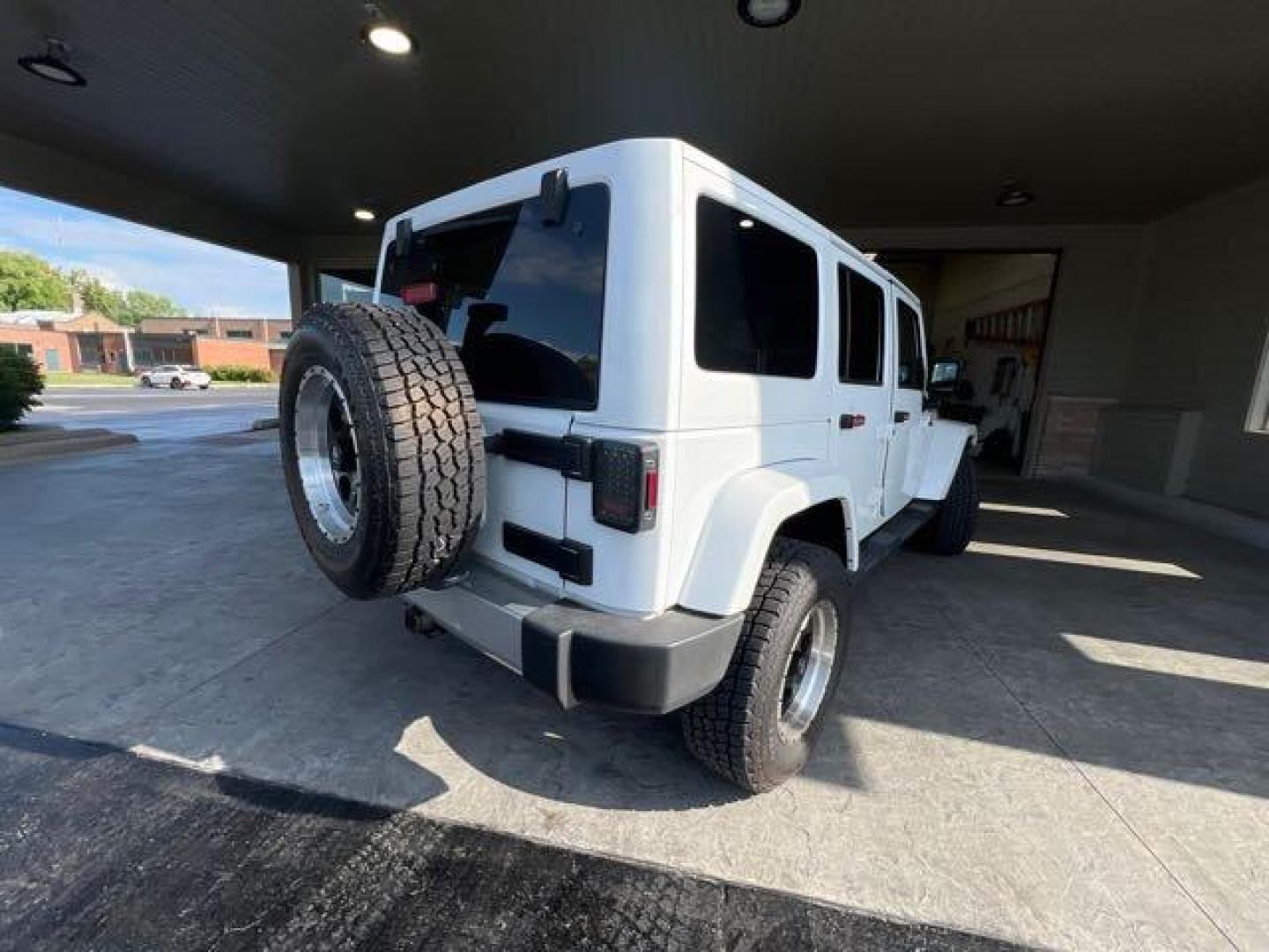 2017 Bright White Clear Coat Jeep Wrangler Unlimited Sahara (1C4HJWEG6HL) with an 3.6L V6 285hp 260ft. lbs. engine, Automatic transmission, located at 25355 Eames Street, Channahon, IL, 60410, (815) 467-1807, 41.429108, -88.228432 - CLEAN LOW MILE LOADED SAHARA! HEATED LEATHER! HARD TOP! If you're ready for a different, no hassle and pleasant car buying experience, then give us a chance! We're breaking the standard Car Sales mold and making one of our very own you'll be sure to appreciate! So, why buy from Crase Auto Connectio - Photo#3