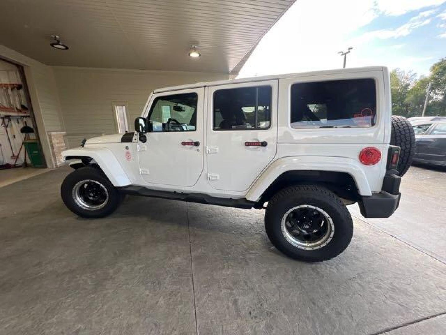 2017 Bright White Clear Coat Jeep Wrangler Unlimited Sahara (1C4HJWEG6HL) with an 3.6L V6 285hp 260ft. lbs. engine, Automatic transmission, located at 25355 Eames Street, Channahon, IL, 60410, (815) 467-1807, 41.429108, -88.228432 - CLEAN LOW MILE LOADED SAHARA! HEATED LEATHER! HARD TOP! If you're ready for a different, no hassle and pleasant car buying experience, then give us a chance! We're breaking the standard Car Sales mold and making one of our very own you'll be sure to appreciate! So, why buy from Crase Auto Connectio - Photo#6