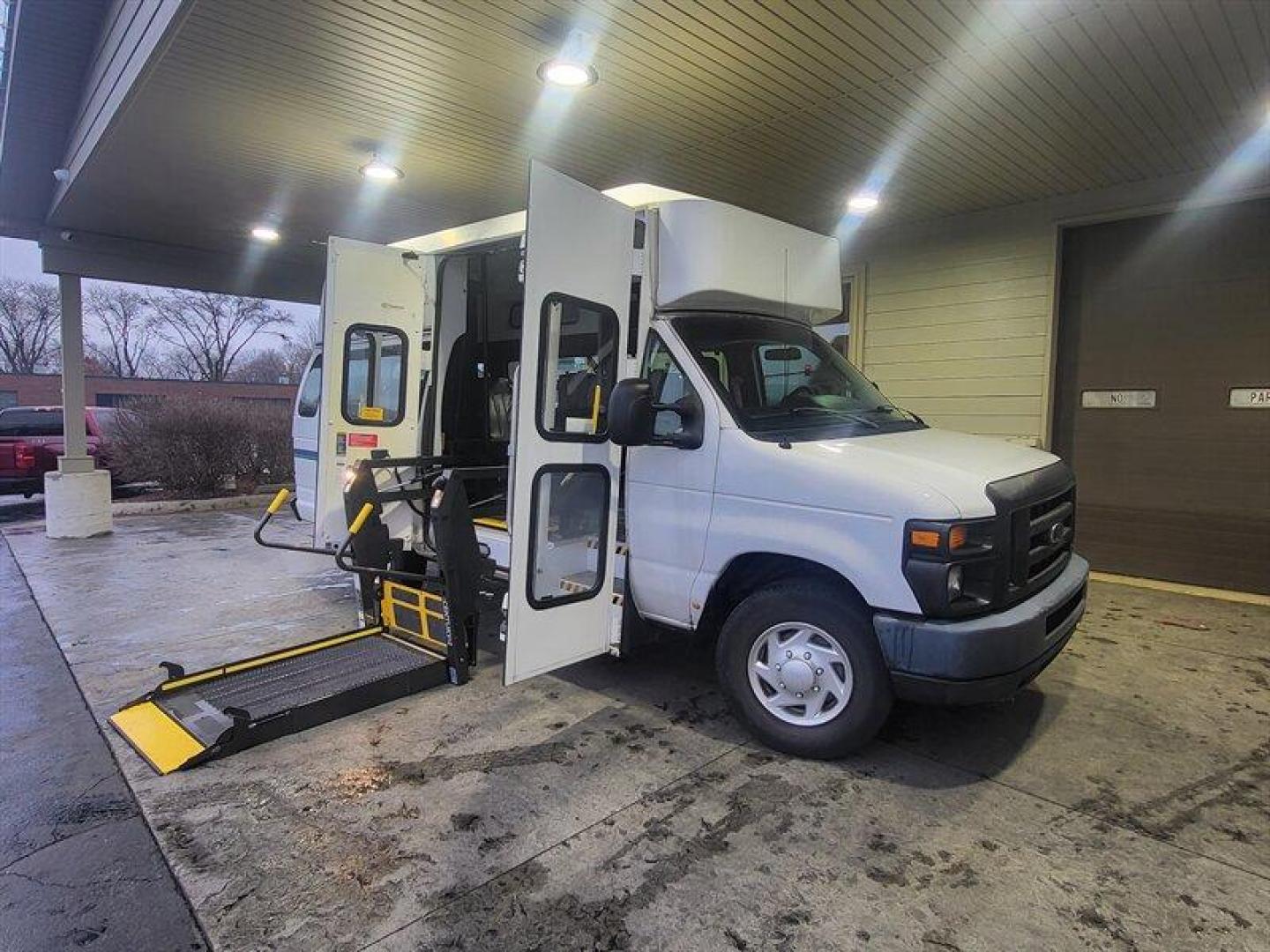 2011 Oxford White Ford Commercial (1FTDS3EL9BD) with an Triton 5.4L Flex Fuel V8 255hp 350ft. lbs. engine, Automatic transmission, located at 25355 Eames Street, Channahon, IL, 60410, (815) 467-1807, 41.429108, -88.228432 - 12 PASSENGER VAN WITH A BRAUN CENTURY 2 SERIES HANDICAP LIFT, ONLY 35,000 MILES. **If you're ready for a different, no hassle and pleasant car buying experience, then give us a chance! We're breaking the standard Car Sales mold and making one of our very own you'll be sure to appreciate! So, why buy - Photo#0