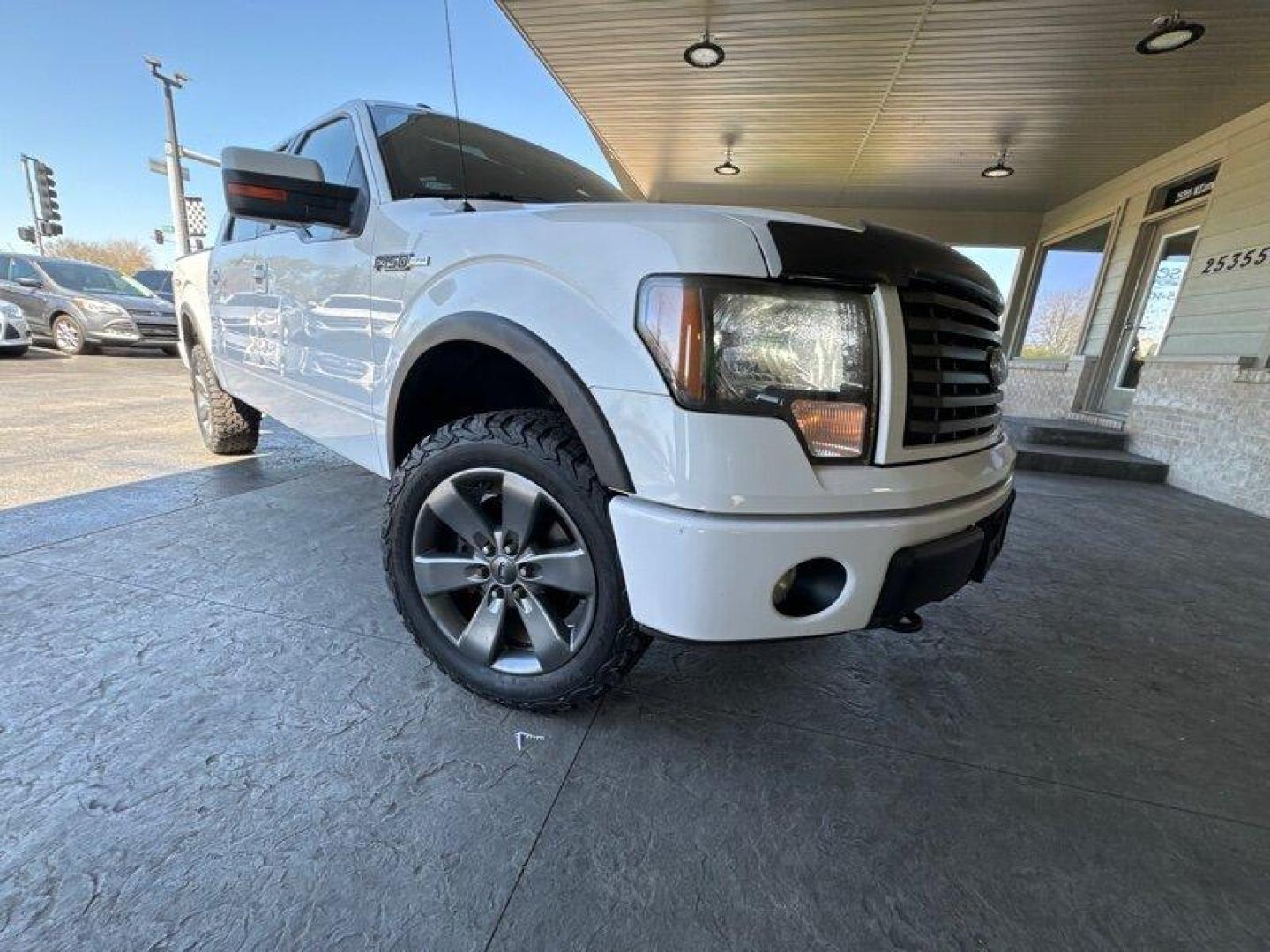 2011 Oxford White Ford F-150 FX4 (1FTFW1EF8BK) with an 5.0L Flex Fuel V8 360hp 380ft. lbs. engine, Automatic transmission, located at 25355 Eames Street, Channahon, IL, 60410, (815) 467-1807, 41.429108, -88.228432 - Looking for a truck that can handle your daily commute and your weekend adventures? Look no further than the 2011 Ford F-150 FX4! This beast is powered by a 5.0L Flex Fuel V8 engine that pumps out 360 horsepower and 380 foot-pounds of torque. And don't worry about stopping to fill up too often - it' - Photo#0