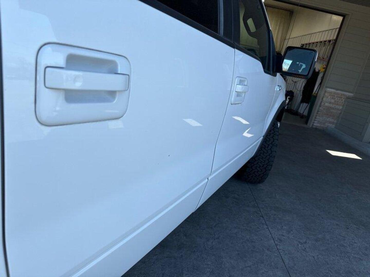 2011 Oxford White Ford F-150 FX4 (1FTFW1EF8BK) with an 5.0L Flex Fuel V8 360hp 380ft. lbs. engine, Automatic transmission, located at 25355 Eames Street, Channahon, IL, 60410, (815) 467-1807, 41.429108, -88.228432 - Looking for a truck that can handle your daily commute and your weekend adventures? Look no further than the 2011 Ford F-150 FX4! This beast is powered by a 5.0L Flex Fuel V8 engine that pumps out 360 horsepower and 380 foot-pounds of torque. And don't worry about stopping to fill up too often - it' - Photo#11