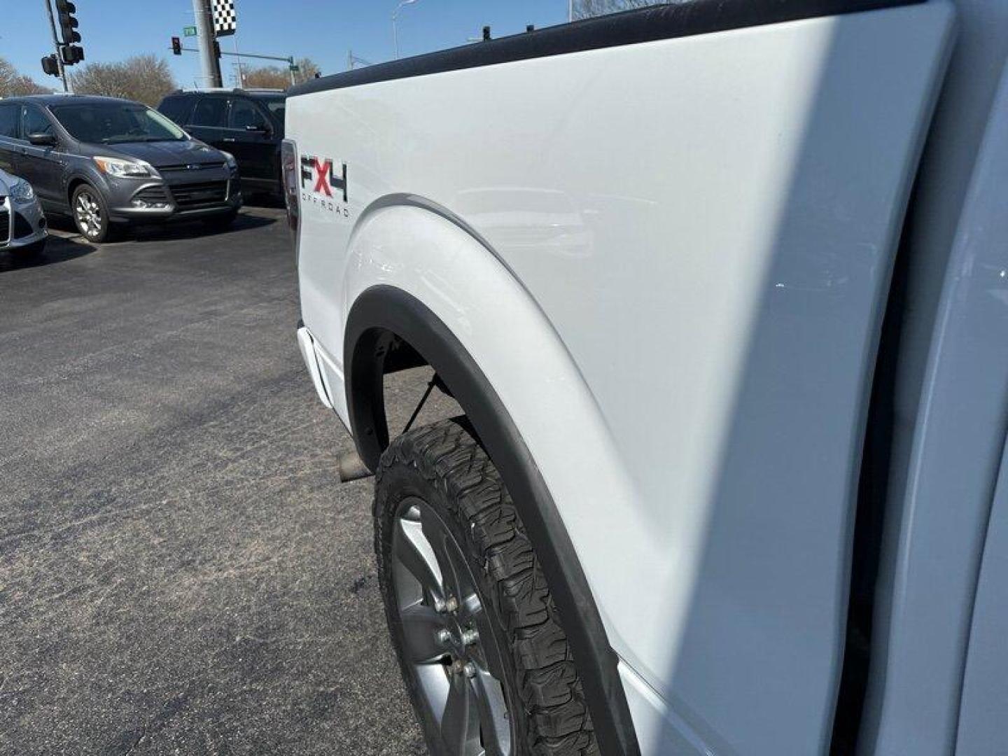 2011 Oxford White Ford F-150 FX4 (1FTFW1EF8BK) with an 5.0L Flex Fuel V8 360hp 380ft. lbs. engine, Automatic transmission, located at 25355 Eames Street, Channahon, IL, 60410, (815) 467-1807, 41.429108, -88.228432 - Looking for a truck that can handle your daily commute and your weekend adventures? Look no further than the 2011 Ford F-150 FX4! This beast is powered by a 5.0L Flex Fuel V8 engine that pumps out 360 horsepower and 380 foot-pounds of torque. And don't worry about stopping to fill up too often - it' - Photo#12