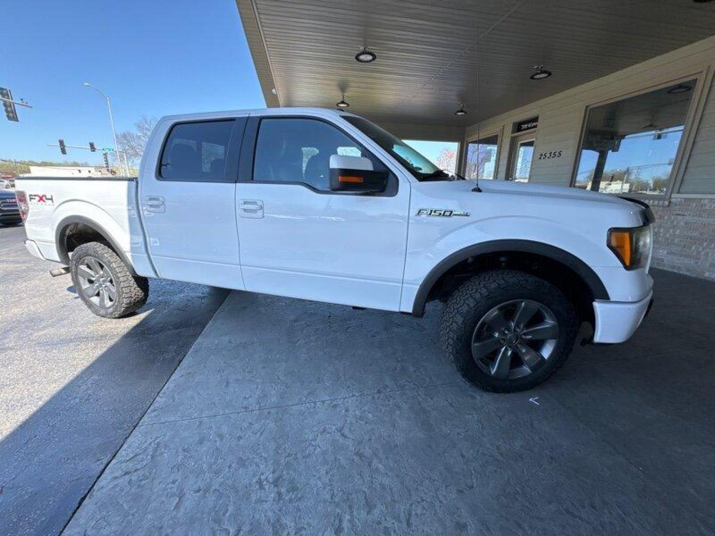 2011 Oxford White Ford F-150 FX4 (1FTFW1EF8BK) with an 5.0L Flex Fuel V8 360hp 380ft. lbs. engine, Automatic transmission, located at 25355 Eames Street, Channahon, IL, 60410, (815) 467-1807, 41.429108, -88.228432 - Looking for a truck that can handle your daily commute and your weekend adventures? Look no further than the 2011 Ford F-150 FX4! This beast is powered by a 5.0L Flex Fuel V8 engine that pumps out 360 horsepower and 380 foot-pounds of torque. And don't worry about stopping to fill up too often - it' - Photo#1