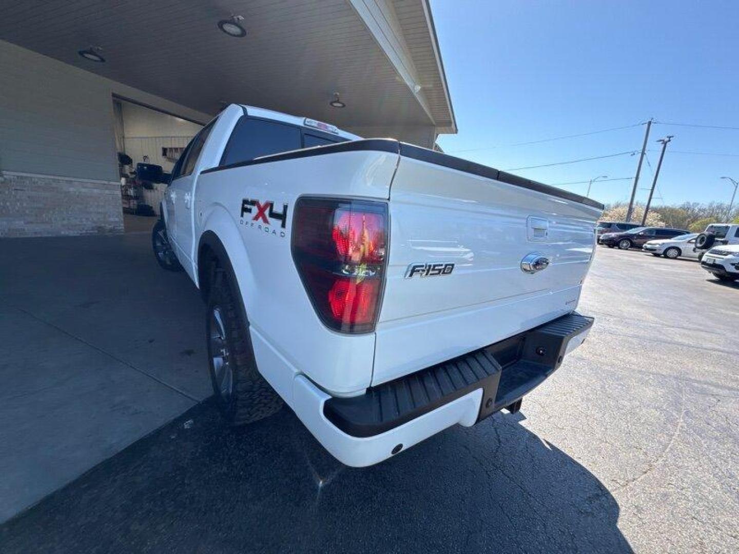 2011 Oxford White Ford F-150 FX4 (1FTFW1EF8BK) with an 5.0L Flex Fuel V8 360hp 380ft. lbs. engine, Automatic transmission, located at 25355 Eames Street, Channahon, IL, 60410, (815) 467-1807, 41.429108, -88.228432 - Looking for a truck that can handle your daily commute and your weekend adventures? Look no further than the 2011 Ford F-150 FX4! This beast is powered by a 5.0L Flex Fuel V8 engine that pumps out 360 horsepower and 380 foot-pounds of torque. And don't worry about stopping to fill up too often - it' - Photo#5