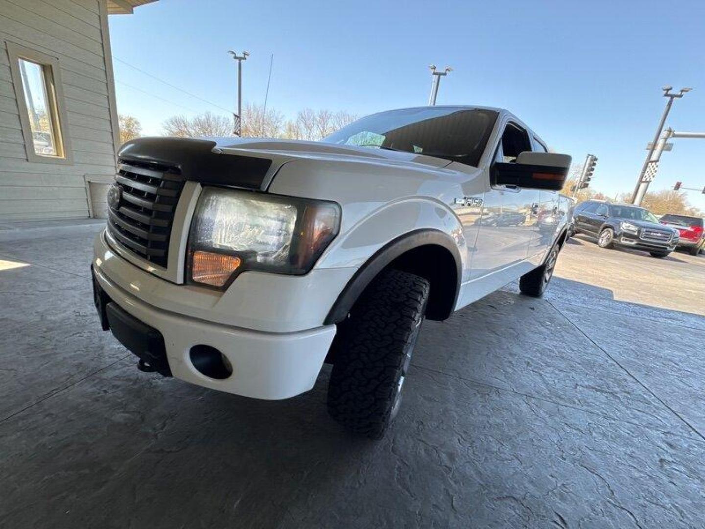 2011 Oxford White Ford F-150 FX4 (1FTFW1EF8BK) with an 5.0L Flex Fuel V8 360hp 380ft. lbs. engine, Automatic transmission, located at 25355 Eames Street, Channahon, IL, 60410, (815) 467-1807, 41.429108, -88.228432 - Looking for a truck that can handle your daily commute and your weekend adventures? Look no further than the 2011 Ford F-150 FX4! This beast is powered by a 5.0L Flex Fuel V8 engine that pumps out 360 horsepower and 380 foot-pounds of torque. And don't worry about stopping to fill up too often - it' - Photo#6