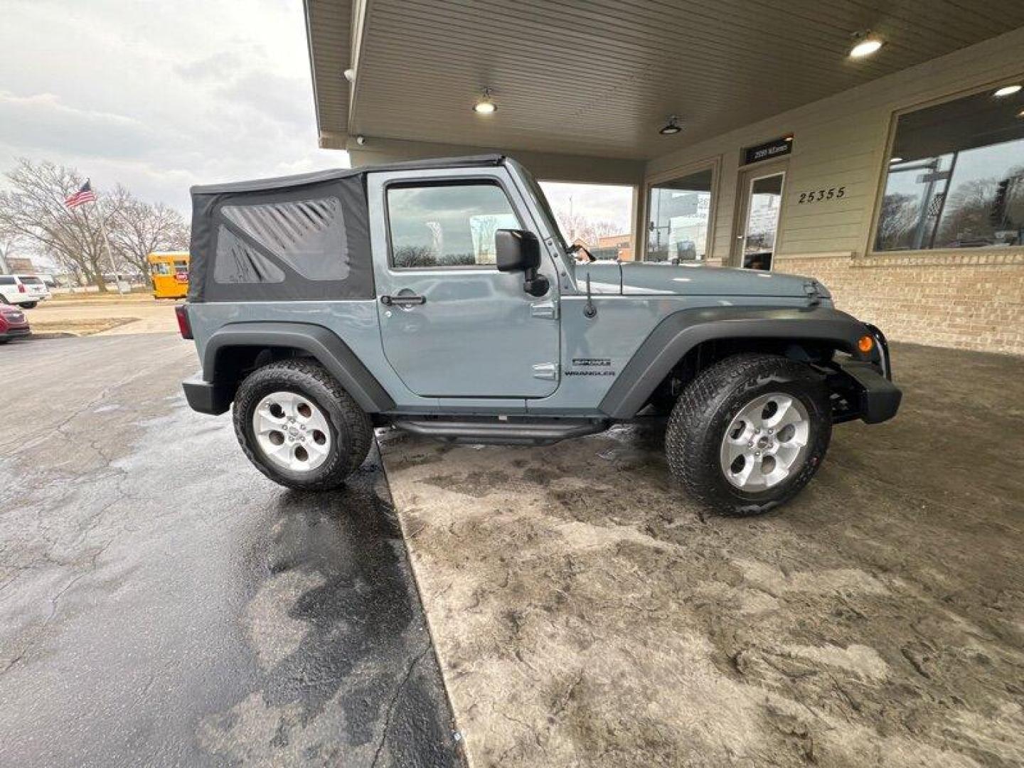 2014 Granite Crystal Metallic Clear Coat Jeep Wrangler Sport (1C4AJWAG3EL) with an 3.6L V6 285hp 260ft. lbs. engine, 6 Speed Manual transmission, located at 25355 Eames Street, Channahon, IL, 60410, (815) 467-1807, 41.429108, -88.228432 - Photo#2