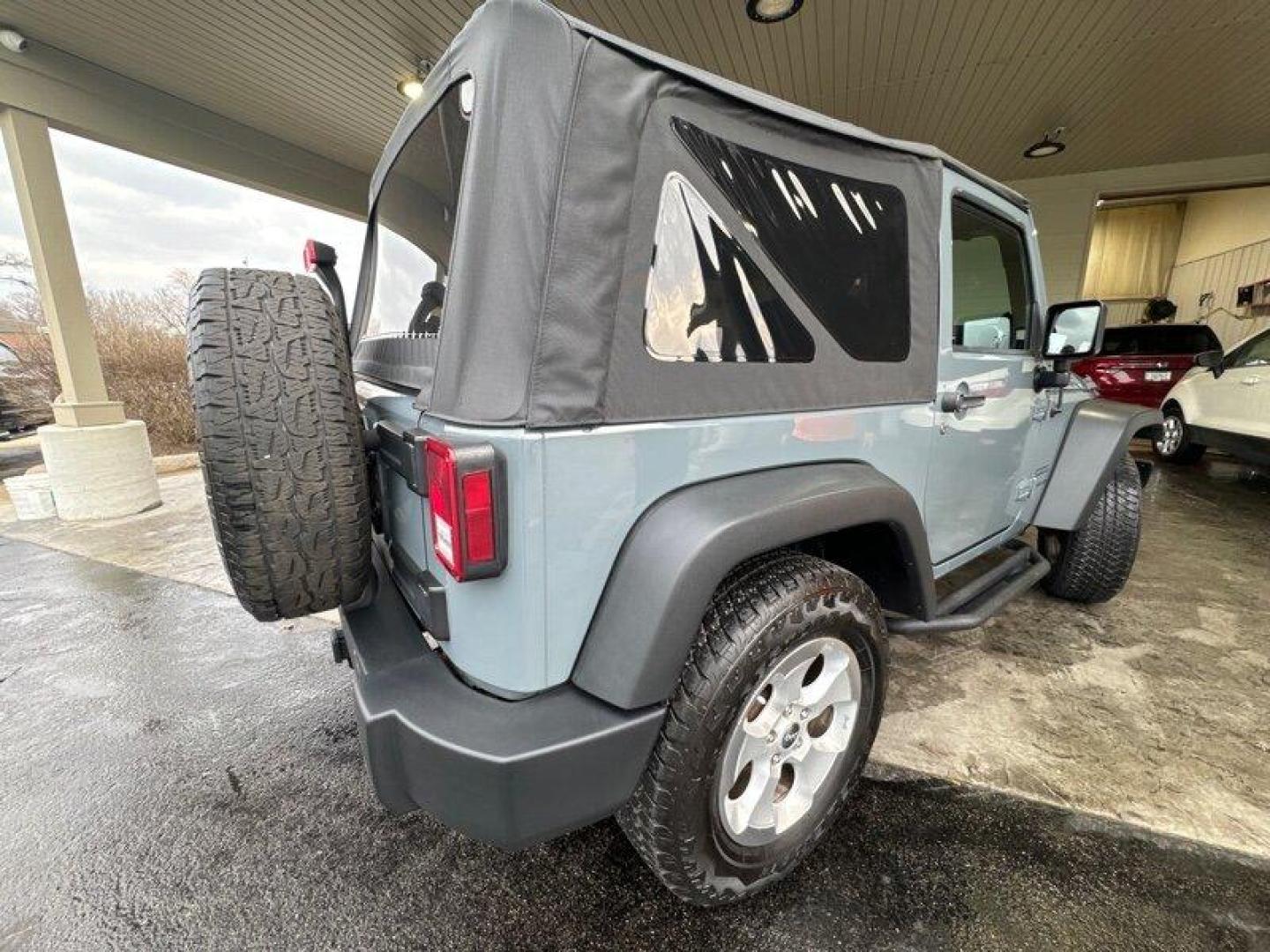 2014 Granite Crystal Metallic Clear Coat Jeep Wrangler Sport (1C4AJWAG3EL) with an 3.6L V6 285hp 260ft. lbs. engine, 6 Speed Manual transmission, located at 25355 Eames Street, Channahon, IL, 60410, (815) 467-1807, 41.429108, -88.228432 - Photo#4