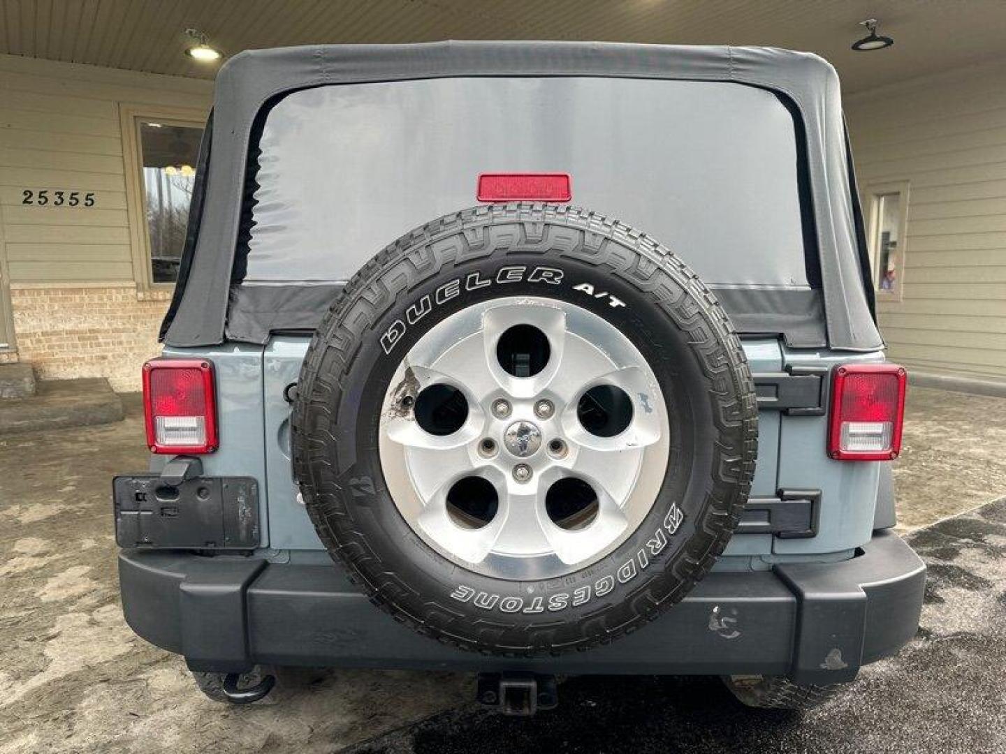 2014 Granite Crystal Metallic Clear Coat Jeep Wrangler Sport (1C4AJWAG3EL) with an 3.6L V6 285hp 260ft. lbs. engine, 6 Speed Manual transmission, located at 25355 Eames Street, Channahon, IL, 60410, (815) 467-1807, 41.429108, -88.228432 - Photo#5