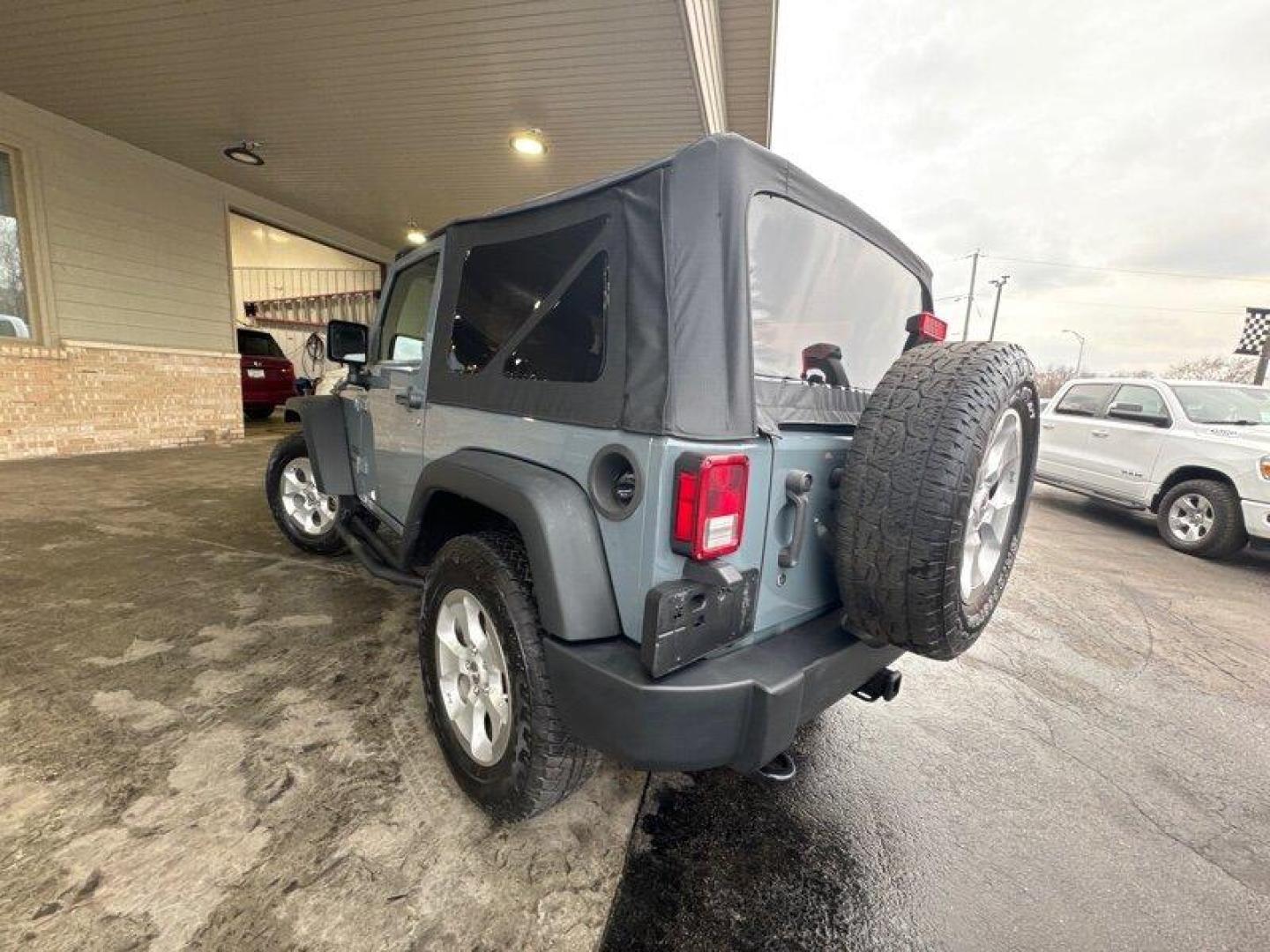 2014 Granite Crystal Metallic Clear Coat Jeep Wrangler Sport (1C4AJWAG3EL) with an 3.6L V6 285hp 260ft. lbs. engine, 6 Speed Manual transmission, located at 25355 Eames Street, Channahon, IL, 60410, (815) 467-1807, 41.429108, -88.228432 - Photo#6