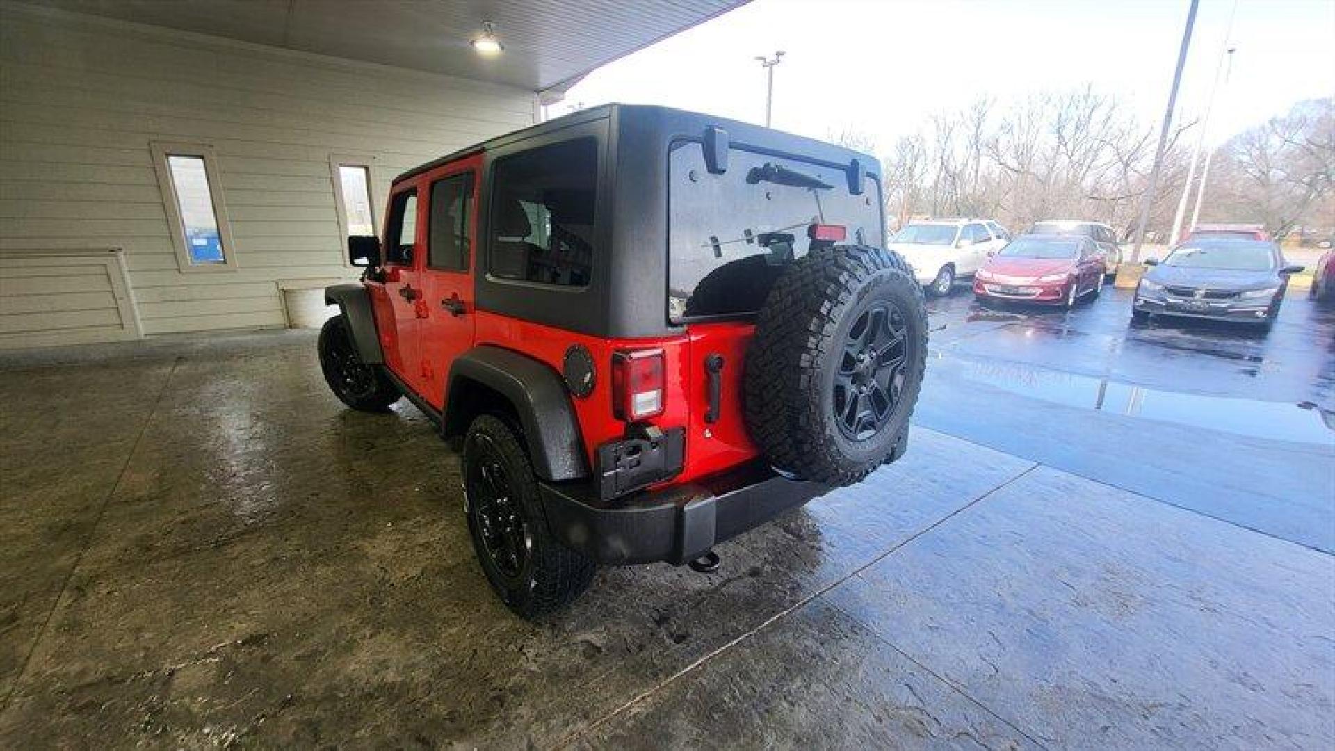 2017 Firecracker Red Clear Coat Jeep Wrangler Unlimited Willys (1C4BJWDG0HL) with an 3.6L V6 285hp 260ft. lbs. engine, Automatic transmission, located at 25355 Eames Street, Channahon, IL, 60410, (815) 467-1807, 41.429108, -88.228432 - Looking for a vehicle that's as rugged as you are? Look no further than the 2017 Jeep Wrangler Unlimited Sport! This beast is powered by a 3.6L V6 engine that delivers a whopping 285 horsepower and 260 foot-pounds of torque. That's enough power to make any other vehicle on the road look like a wimpy - Photo#7