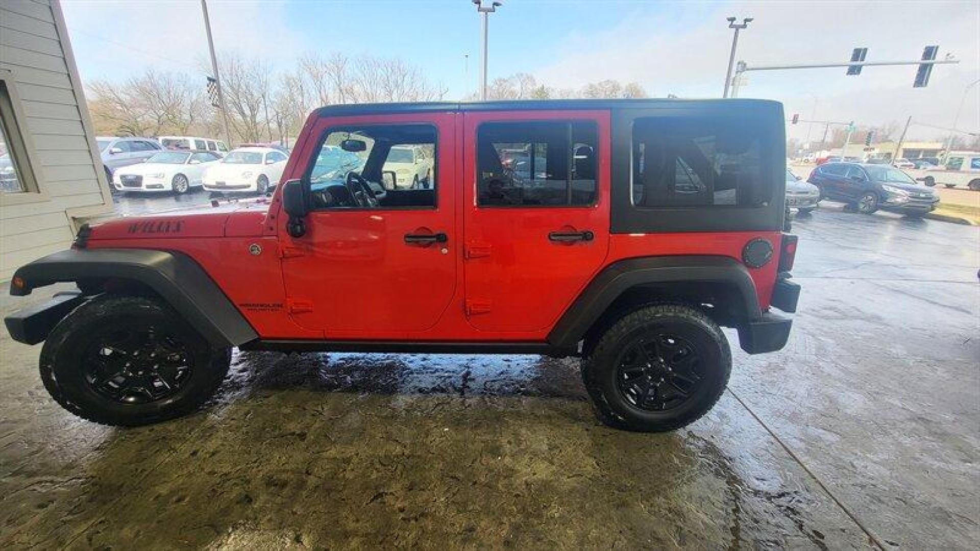 2017 Firecracker Red Clear Coat Jeep Wrangler Unlimited Willys (1C4BJWDG0HL) with an 3.6L V6 285hp 260ft. lbs. engine, Automatic transmission, located at 25355 Eames Street, Channahon, IL, 60410, (815) 467-1807, 41.429108, -88.228432 - Looking for a vehicle that's as rugged as you are? Look no further than the 2017 Jeep Wrangler Unlimited Sport! This beast is powered by a 3.6L V6 engine that delivers a whopping 285 horsepower and 260 foot-pounds of torque. That's enough power to make any other vehicle on the road look like a wimpy - Photo#8