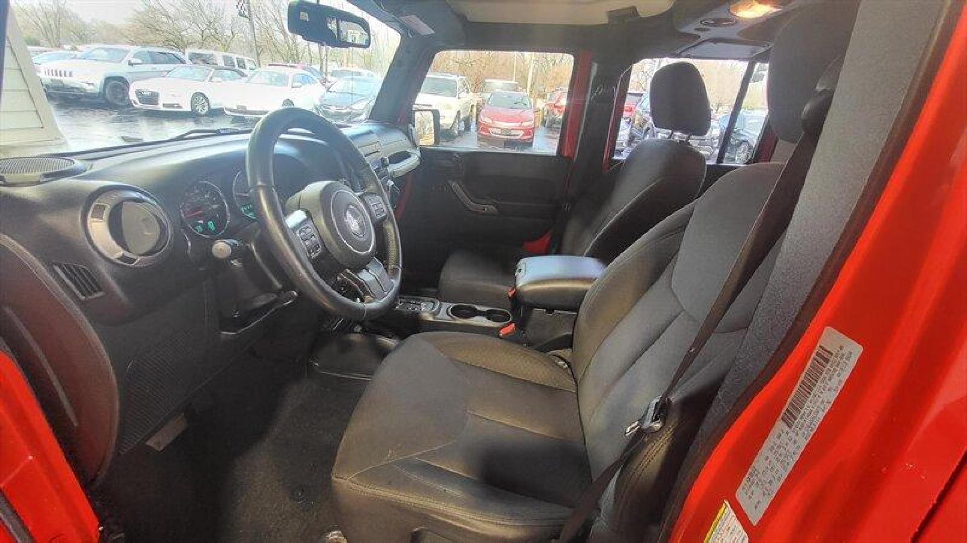 2017 Firecracker Red Clear Coat Jeep Wrangler Unlimited Willys (1C4BJWDG0HL) with an 3.6L V6 285hp 260ft. lbs. engine, Automatic transmission, located at 25355 Eames Street, Channahon, IL, 60410, (815) 467-1807, 41.429108, -88.228432 - Looking for a vehicle that's as rugged as you are? Look no further than the 2017 Jeep Wrangler Unlimited Sport! This beast is powered by a 3.6L V6 engine that delivers a whopping 285 horsepower and 260 foot-pounds of torque. That's enough power to make any other vehicle on the road look like a wimpy - Photo#13