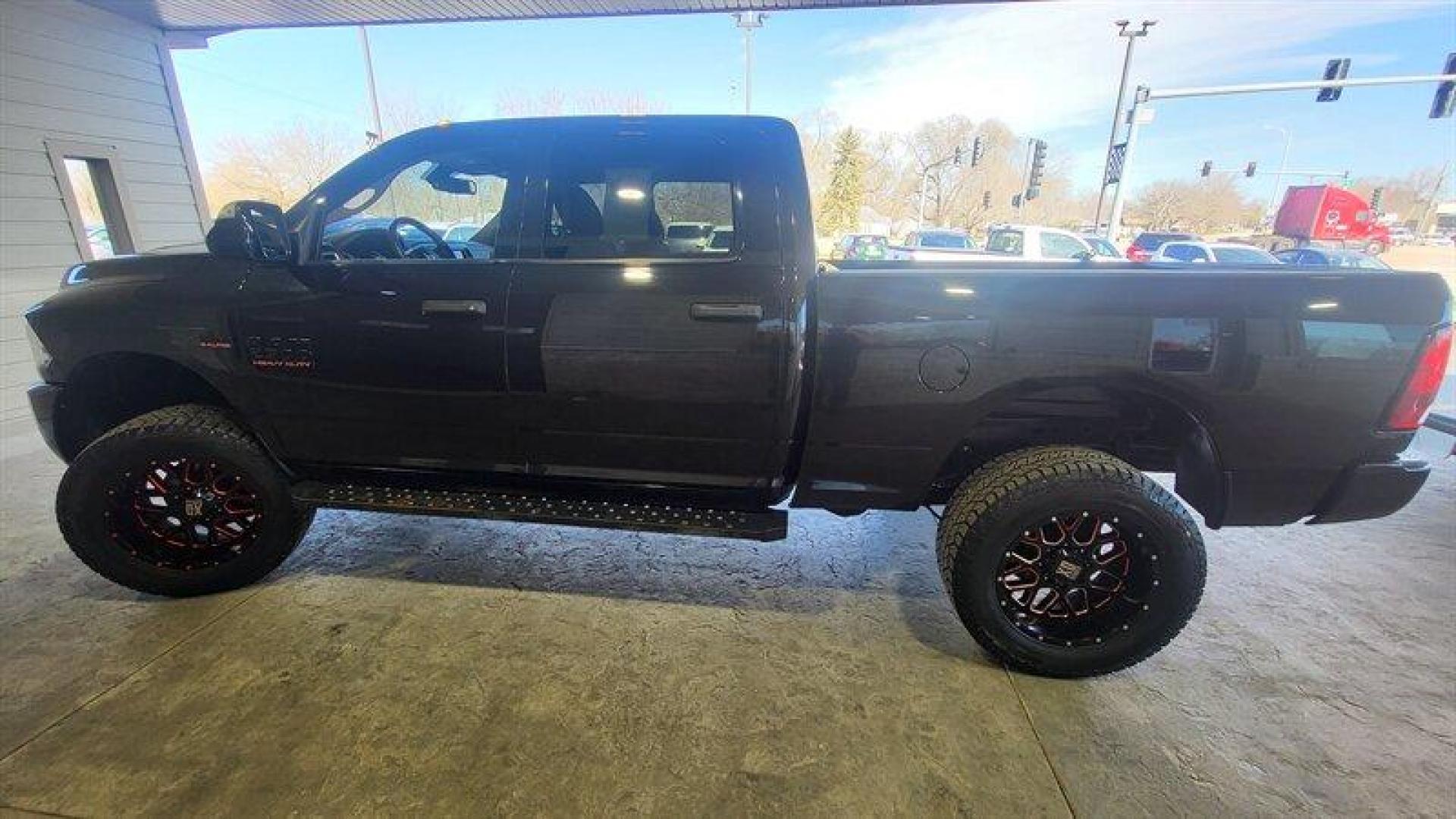 2017 Brilliant Black Crystal Pearl Coat RAM 2500 Big Horn (3C6UR5DJXHG) with an HEMI 6.4L V8 410hp 429ft. lbs. engine, Automatic transmission, located at 25355 Eames Street, Channahon, IL, 60410, (815) 467-1807, 41.429108, -88.228432 - Introducing the 2017 RAM 2500 Big Horn, an impressive and powerful pickup truck designed to meet your heavy-duty needs. Under the hood, this truck is powered by a HEMI 6.4L V8 engine that delivers an impressive 410 horsepower and 429 ft-lbs of torque. With only 54,000 miles on the odometer, averagin - Photo#7