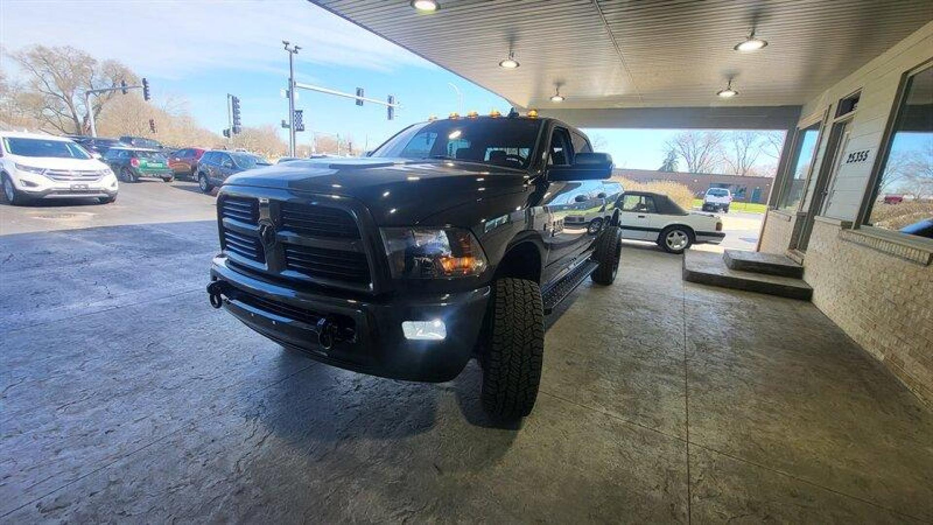 2017 Brilliant Black Crystal Pearl Coat RAM 2500 Big Horn (3C6UR5DJXHG) with an HEMI 6.4L V8 410hp 429ft. lbs. engine, Automatic transmission, located at 25355 Eames Street, Channahon, IL, 60410, (815) 467-1807, 41.429108, -88.228432 - Introducing the 2017 RAM 2500 Big Horn, an impressive and powerful pickup truck designed to meet your heavy-duty needs. Under the hood, this truck is powered by a HEMI 6.4L V8 engine that delivers an impressive 410 horsepower and 429 ft-lbs of torque. With only 54,000 miles on the odometer, averagin - Photo#8