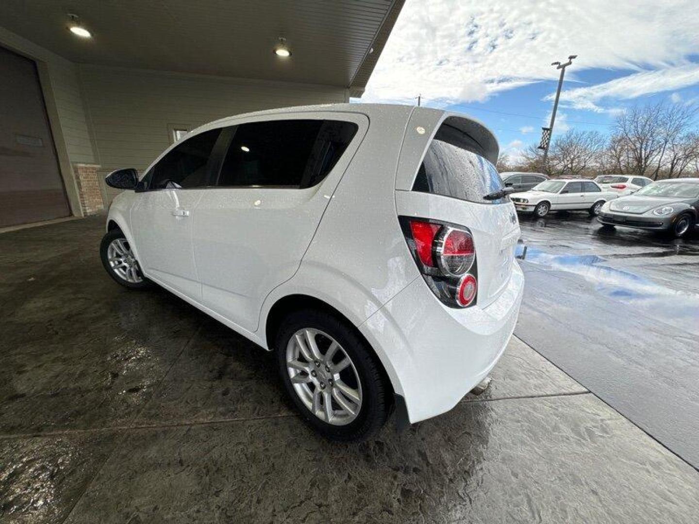 2015 Summit White Chevrolet Sonic LT (1G1JC6SBXF4) with an Ecotec 1.4L Turbo I4 138hp 148ft. lbs. engine, Automatic transmission, located at 25355 Eames Street, Channahon, IL, 60410, (815) 467-1807, 41.429108, -88.228432 - Looking for a car that's small but mighty? Look no further than the 2015 Chevrolet Sonic LT Auto! This bad boy is powered by an Ecotec 1.4L Turbo I4 engine that's just itching to hit the open road. With 138 horsepower and 148 foot-pounds of torque, you'll be zipping around town like a pro. But it's - Photo#5