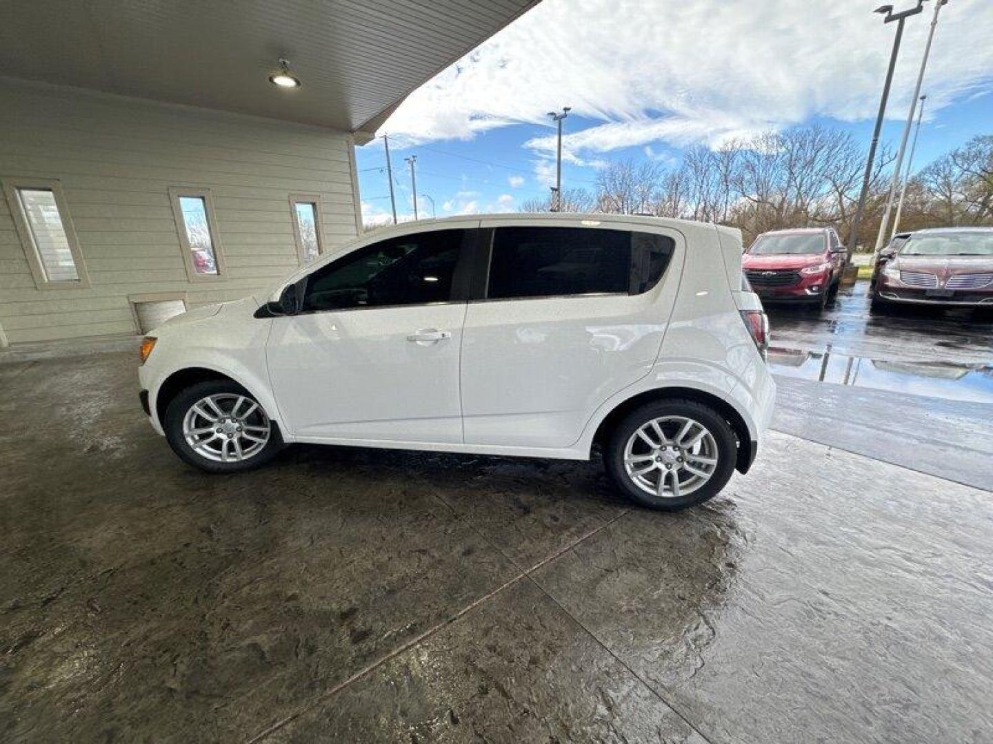 2015 Summit White Chevrolet Sonic LT (1G1JC6SBXF4) with an Ecotec 1.4L Turbo I4 138hp 148ft. lbs. engine, Automatic transmission, located at 25355 Eames Street, Channahon, IL, 60410, (815) 467-1807, 41.429108, -88.228432 - Looking for a car that's small but mighty? Look no further than the 2015 Chevrolet Sonic LT Auto! This bad boy is powered by an Ecotec 1.4L Turbo I4 engine that's just itching to hit the open road. With 138 horsepower and 148 foot-pounds of torque, you'll be zipping around town like a pro. But it's - Photo#6