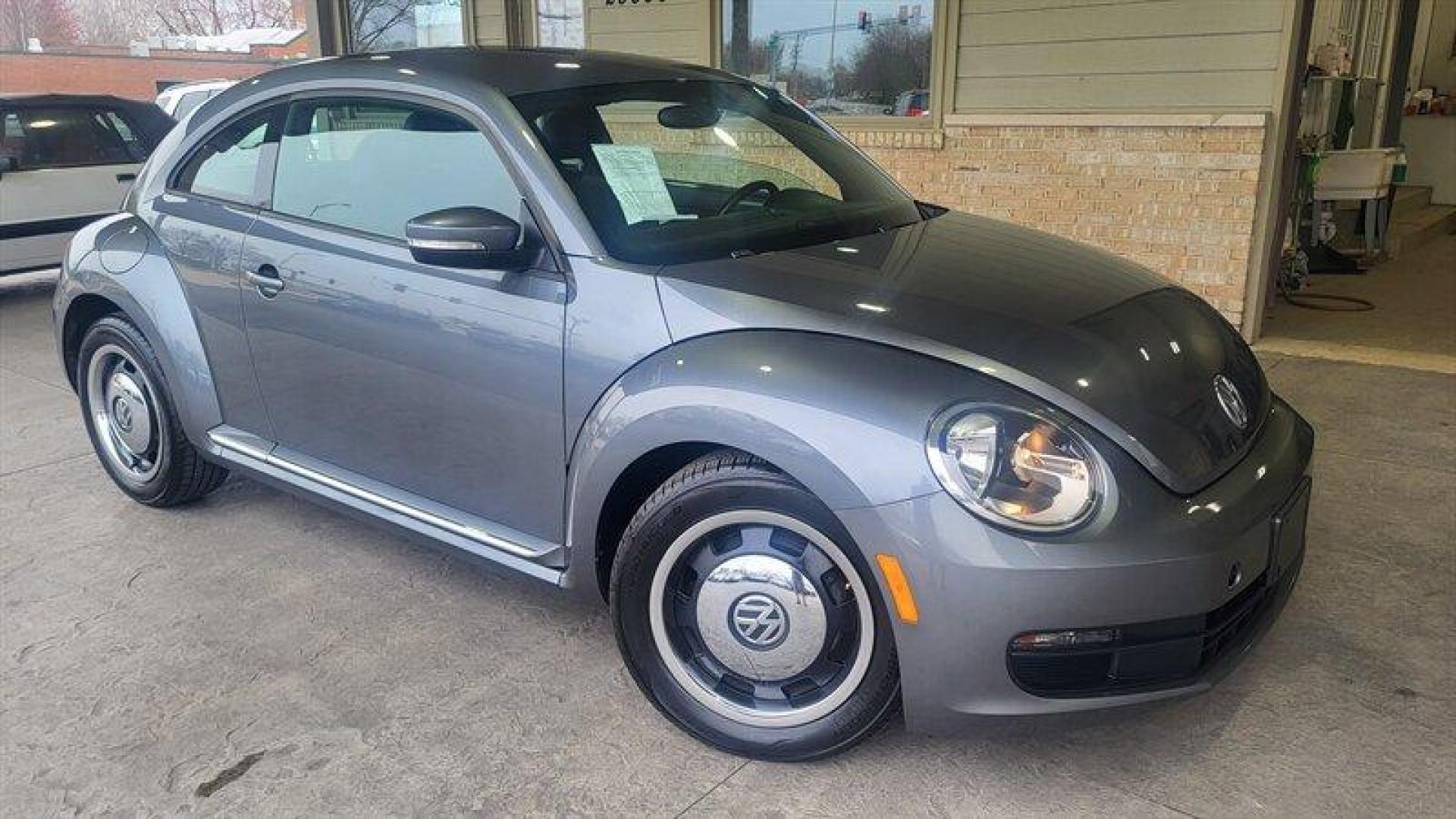 2012 Platinum Gray Metallic Volkswagen Beetle-Classic 2.5L (3VWJP7AT3CM) with an 2.5L I5 170hp 177ft. lbs. PZEV engine, Automatic transmission, located at 25355 Eames Street, Channahon, IL, 60410, (815) 467-1807, 41.429108, -88.228432 - Looking for a fun and stylish ride that's also fuel-efficient? Look no further than the 2012 Volkswagen Beetle-Classic 2.5L PZEV! With just under 96,000 miles on the odometer and an average of less than 8,000 miles driven per year, this car has plenty of life left in it. And with a fuel economy rati - Photo#0