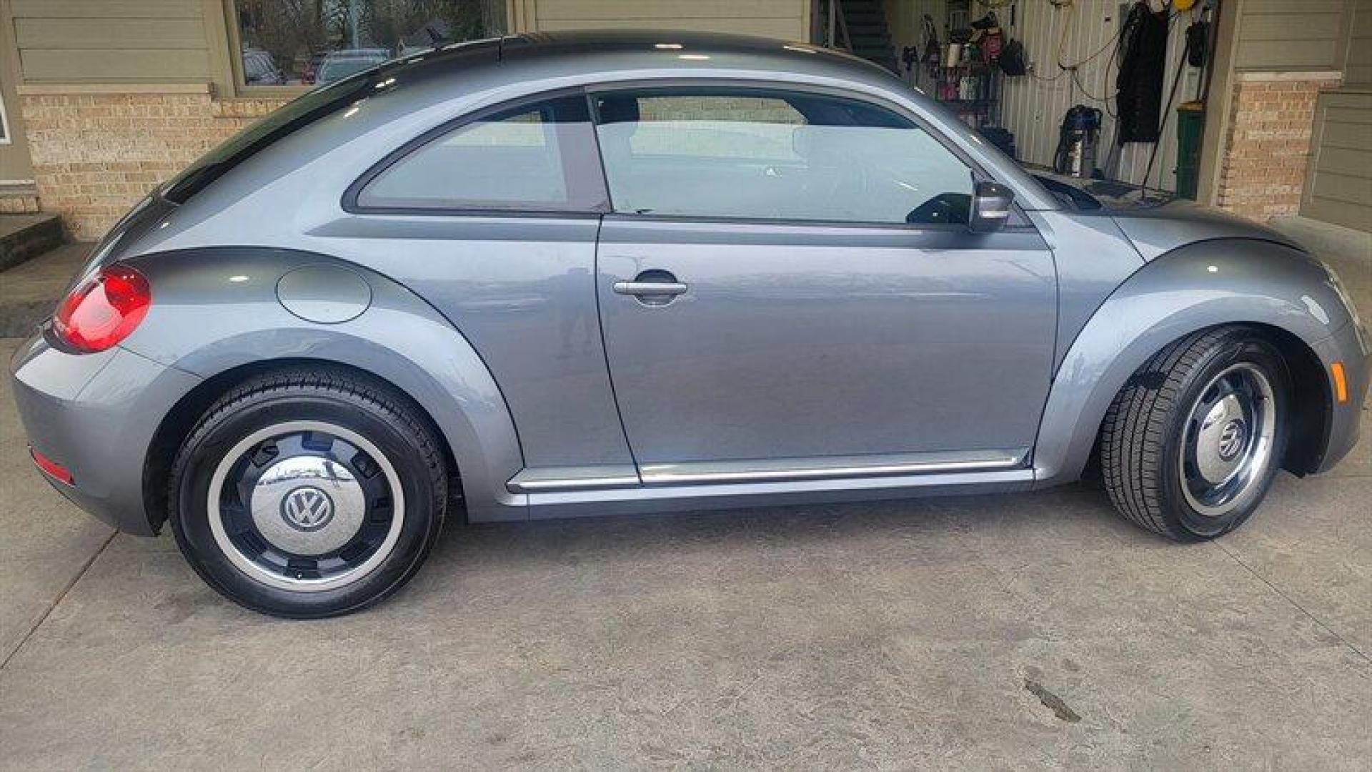 2012 Platinum Gray Metallic Volkswagen Beetle-Classic 2.5L (3VWJP7AT3CM) with an 2.5L I5 170hp 177ft. lbs. PZEV engine, Automatic transmission, located at 25355 Eames Street, Channahon, IL, 60410, (815) 467-1807, 41.429108, -88.228432 - Looking for a fun and stylish ride that's also fuel-efficient? Look no further than the 2012 Volkswagen Beetle-Classic 2.5L PZEV! With just under 96,000 miles on the odometer and an average of less than 8,000 miles driven per year, this car has plenty of life left in it. And with a fuel economy rati - Photo#4