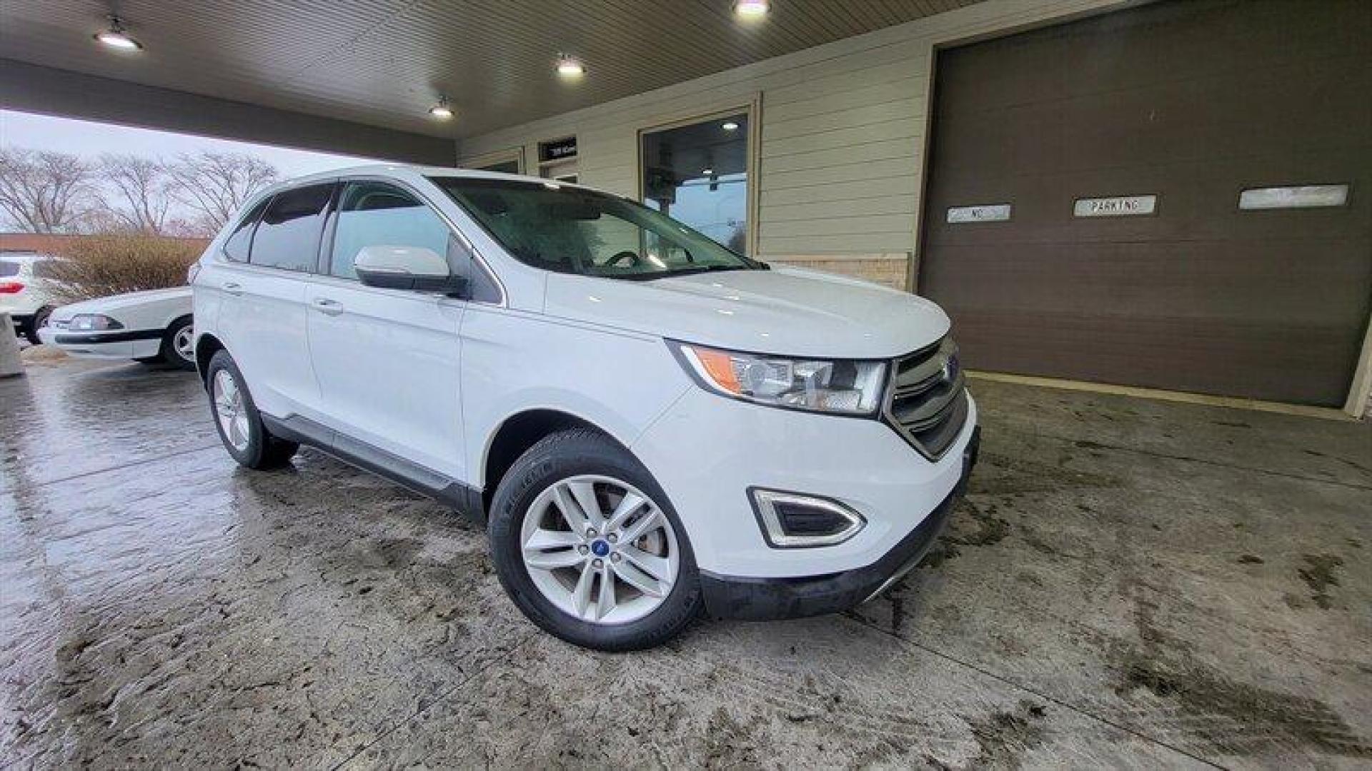 2016 Oxford White Ford Edge SEL (2FMPK3J99GB) with an EcoBoost 2.0L Turbo I4 245hp 275ft. lbs. engine, Automatic transmission, located at 25355 Eames Street, Channahon, IL, 60410, (815) 467-1807, 41.429108, -88.228432 - Looking for a vehicle that's got style, power, and all the latest features? Look no further than the 2016 Ford Edge SEL! This bad boy comes equipped with a 2.0L EcoBoost Turbo engine that'll have you flying down the highway like a bat out of hell. With 245 horsepower and 275ft. lbs. of torque, you'l - Photo#0