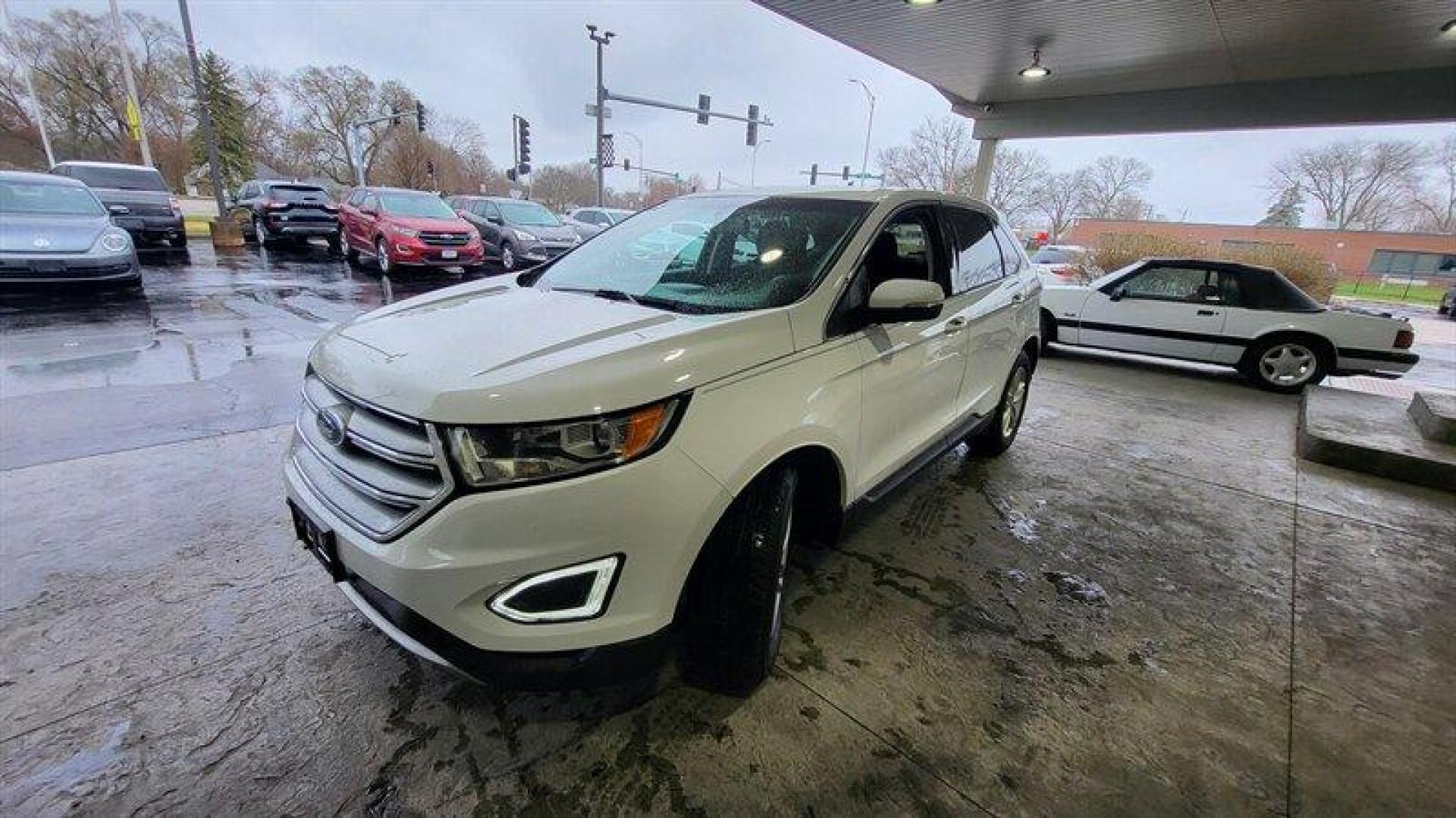 2016 Oxford White Ford Edge SEL (2FMPK3J99GB) with an EcoBoost 2.0L Turbo I4 245hp 275ft. lbs. engine, Automatic transmission, located at 25355 Eames Street, Channahon, IL, 60410, (815) 467-1807, 41.429108, -88.228432 - Looking for a vehicle that's got style, power, and all the latest features? Look no further than the 2016 Ford Edge SEL! This bad boy comes equipped with a 2.0L EcoBoost Turbo engine that'll have you flying down the highway like a bat out of hell. With 245 horsepower and 275ft. lbs. of torque, you'l - Photo#12