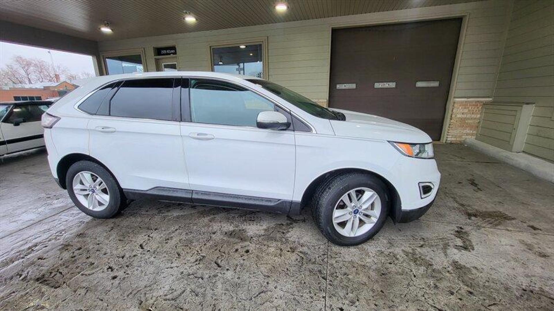 2016 Oxford White Ford Edge SEL (2FMPK3J99GB) with an EcoBoost 2.0L Turbo I4 245hp 275ft. lbs. engine, Automatic transmission, located at 25355 Eames Street, Channahon, IL, 60410, (815) 467-1807, 41.429108, -88.228432 - Looking for a vehicle that's got style, power, and all the latest features? Look no further than the 2016 Ford Edge SEL! This bad boy comes equipped with a 2.0L EcoBoost Turbo engine that'll have you flying down the highway like a bat out of hell. With 245 horsepower and 275ft. lbs. of torque, you'l - Photo#2