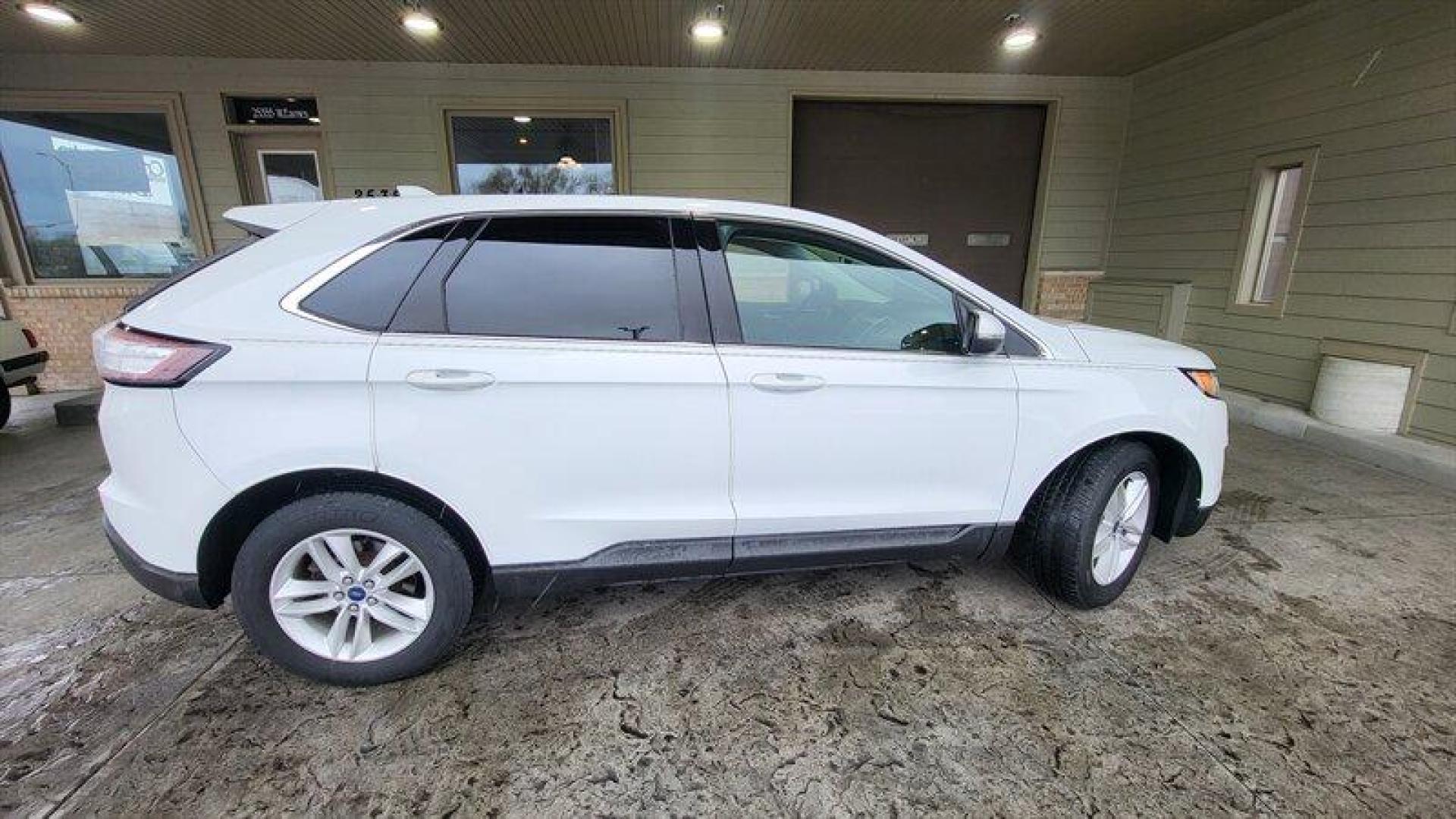 2016 Oxford White Ford Edge SEL (2FMPK3J99GB) with an EcoBoost 2.0L Turbo I4 245hp 275ft. lbs. engine, Automatic transmission, located at 25355 Eames Street, Channahon, IL, 60410, (815) 467-1807, 41.429108, -88.228432 - Looking for a vehicle that's got style, power, and all the latest features? Look no further than the 2016 Ford Edge SEL! This bad boy comes equipped with a 2.0L EcoBoost Turbo engine that'll have you flying down the highway like a bat out of hell. With 245 horsepower and 275ft. lbs. of torque, you'l - Photo#4