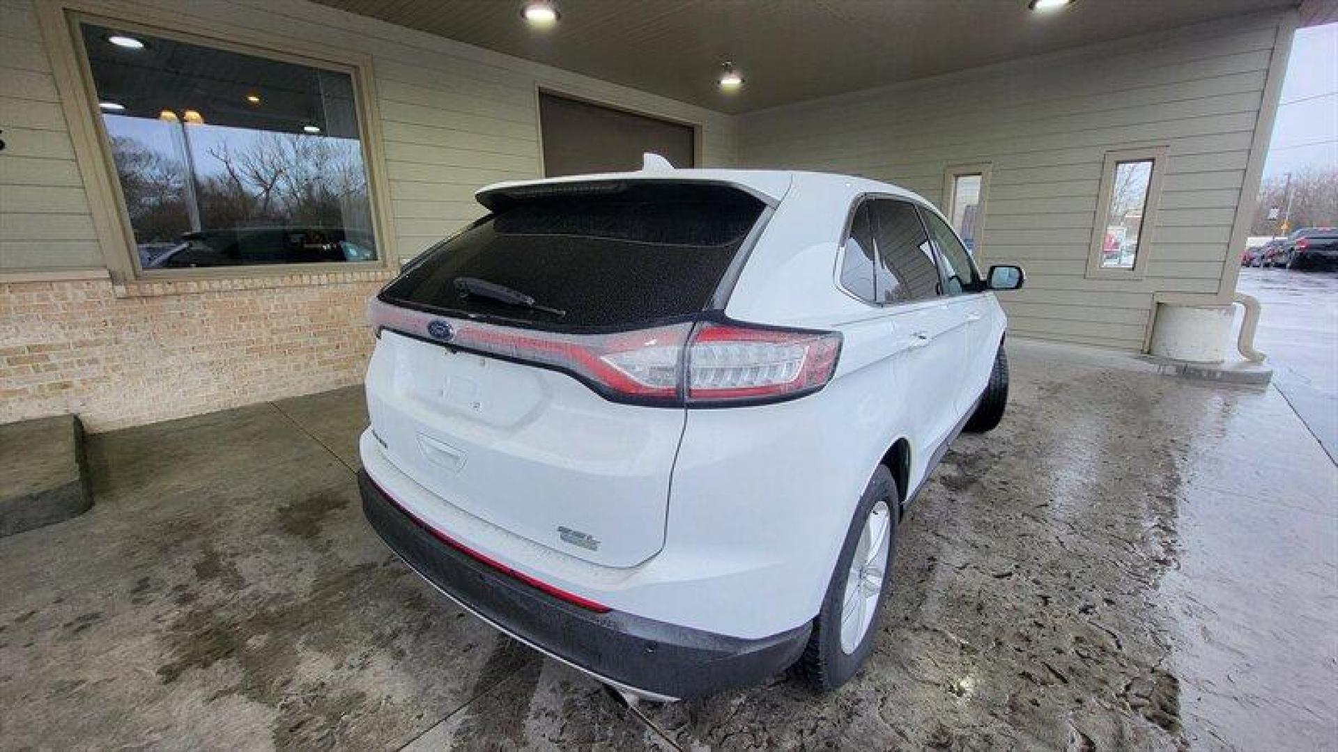 2016 Oxford White Ford Edge SEL (2FMPK3J99GB) with an EcoBoost 2.0L Turbo I4 245hp 275ft. lbs. engine, Automatic transmission, located at 25355 Eames Street, Channahon, IL, 60410, (815) 467-1807, 41.429108, -88.228432 - Looking for a vehicle that's got style, power, and all the latest features? Look no further than the 2016 Ford Edge SEL! This bad boy comes equipped with a 2.0L EcoBoost Turbo engine that'll have you flying down the highway like a bat out of hell. With 245 horsepower and 275ft. lbs. of torque, you'l - Photo#6