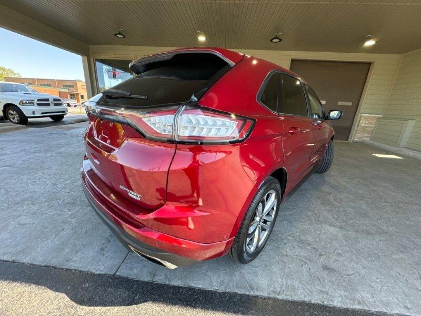 2016 Ruby Red Metallic Tinted Clearcoat Ford Edge Sport (2FMPK4AP4GB) with an EcoBoost 2.7L Turbo V6 315hp 350ft. lbs. engine, Automatic transmission, located at 25355 Eames Street, Channahon, IL, 60410, (815) 467-1807, 41.429108, -88.228432 - Introducing the 2016 Ford Edge Sport, the perfect car for those who refuse to compromise on style, power, and comfort. This Ruby Red Metallic Tinted Clearcoat beauty is powered by a 2.7L Turbo V6 engine that packs a punch with 315 horsepower and 350ft. lbs of torque. It's so powerful, you'll feel li - Photo#4