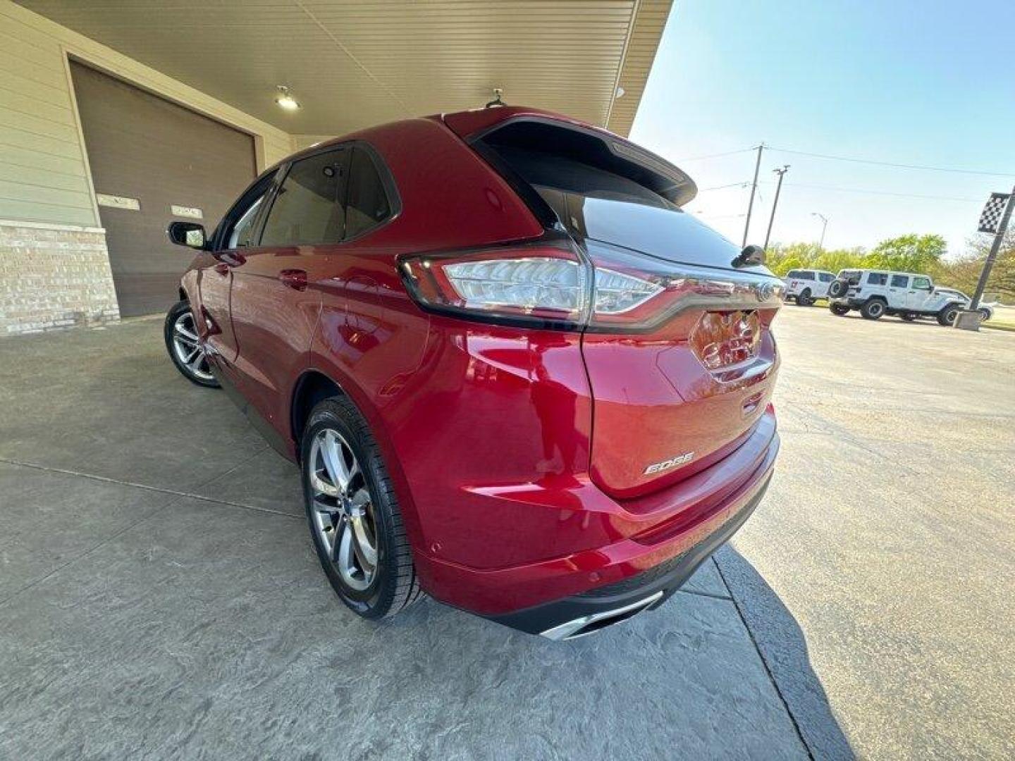 2016 Ruby Red Metallic Tinted Clearcoat Ford Edge Sport (2FMPK4AP4GB) with an EcoBoost 2.7L Turbo V6 315hp 350ft. lbs. engine, Automatic transmission, located at 25355 Eames Street, Channahon, IL, 60410, (815) 467-1807, 41.429108, -88.228432 - Introducing the 2016 Ford Edge Sport, the perfect car for those who refuse to compromise on style, power, and comfort. This Ruby Red Metallic Tinted Clearcoat beauty is powered by a 2.7L Turbo V6 engine that packs a punch with 315 horsepower and 350ft. lbs of torque. It's so powerful, you'll feel li - Photo#6