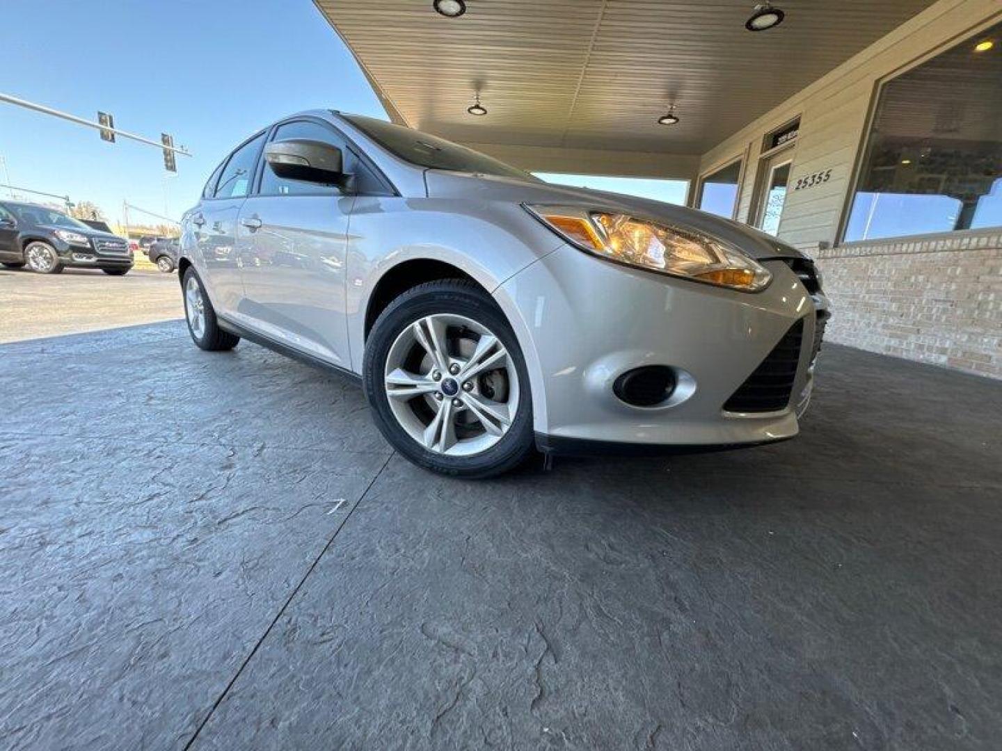 2014 Ingot Silver Metallic Ford Focus SE (1FADP3K27EL) with an 2.0L Flex Fuel I4 160hp 146ft. lbs. engine, Automatic transmission, located at 25355 Eames Street, Channahon, IL, 60410, (815) 467-1807, 41.429108, -88.228432 - Introducing the 2014 Ford Focus SE, an impressive compact car that boasts a powerful 2.0L Flex Fuel I4 engine, capable of delivering 160 horsepower and 146ft. lbs. of torque. With below 51,000 miles on the odometer, this vehicle has been driven less than 5,000 miles per year, making it a great optio - Photo#0