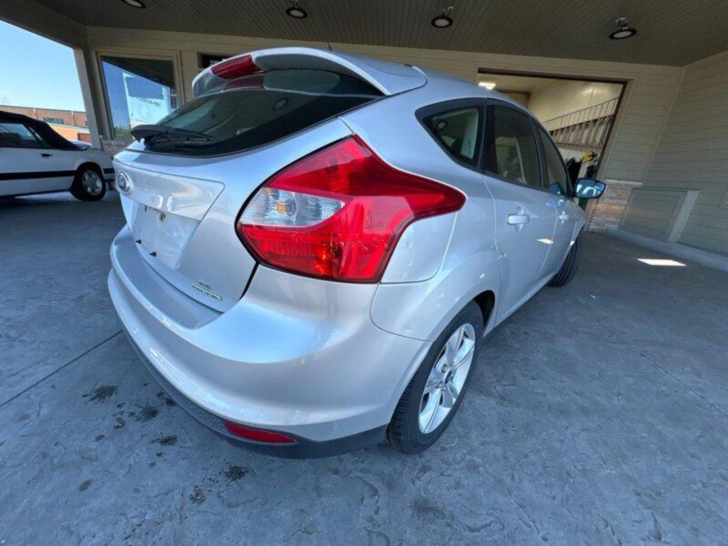 2014 Ingot Silver Metallic Ford Focus SE (1FADP3K27EL) with an 2.0L Flex Fuel I4 160hp 146ft. lbs. engine, Automatic transmission, located at 25355 Eames Street, Channahon, IL, 60410, (815) 467-1807, 41.429108, -88.228432 - Introducing the 2014 Ford Focus SE, an impressive compact car that boasts a powerful 2.0L Flex Fuel I4 engine, capable of delivering 160 horsepower and 146ft. lbs. of torque. With below 51,000 miles on the odometer, this vehicle has been driven less than 5,000 miles per year, making it a great optio - Photo#2