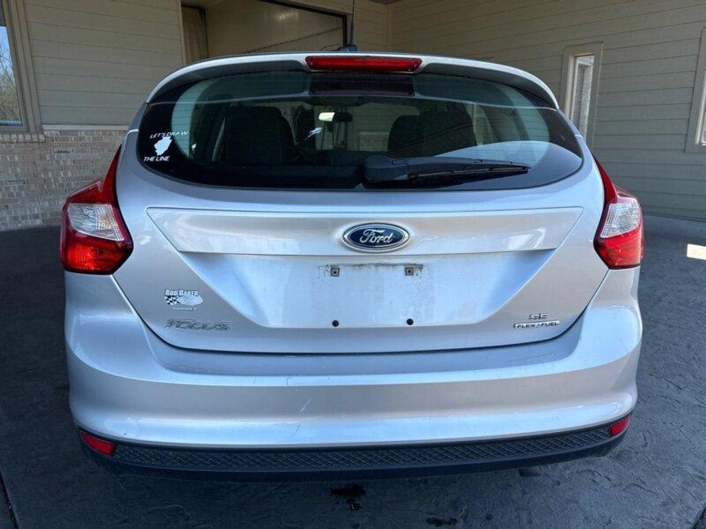 2014 Ingot Silver Metallic Ford Focus SE (1FADP3K27EL) with an 2.0L Flex Fuel I4 160hp 146ft. lbs. engine, Automatic transmission, located at 25355 Eames Street, Channahon, IL, 60410, (815) 467-1807, 41.429108, -88.228432 - Introducing the 2014 Ford Focus SE, an impressive compact car that boasts a powerful 2.0L Flex Fuel I4 engine, capable of delivering 160 horsepower and 146ft. lbs. of torque. With below 51,000 miles on the odometer, this vehicle has been driven less than 5,000 miles per year, making it a great optio - Photo#3