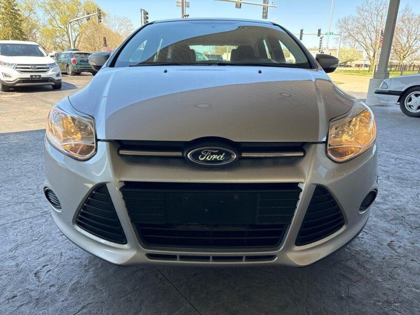 2014 Ingot Silver Metallic Ford Focus SE (1FADP3K27EL) with an 2.0L Flex Fuel I4 160hp 146ft. lbs. engine, Automatic transmission, located at 25355 Eames Street, Channahon, IL, 60410, (815) 467-1807, 41.429108, -88.228432 - Introducing the 2014 Ford Focus SE, an impressive compact car that boasts a powerful 2.0L Flex Fuel I4 engine, capable of delivering 160 horsepower and 146ft. lbs. of torque. With below 51,000 miles on the odometer, this vehicle has been driven less than 5,000 miles per year, making it a great optio - Photo#7