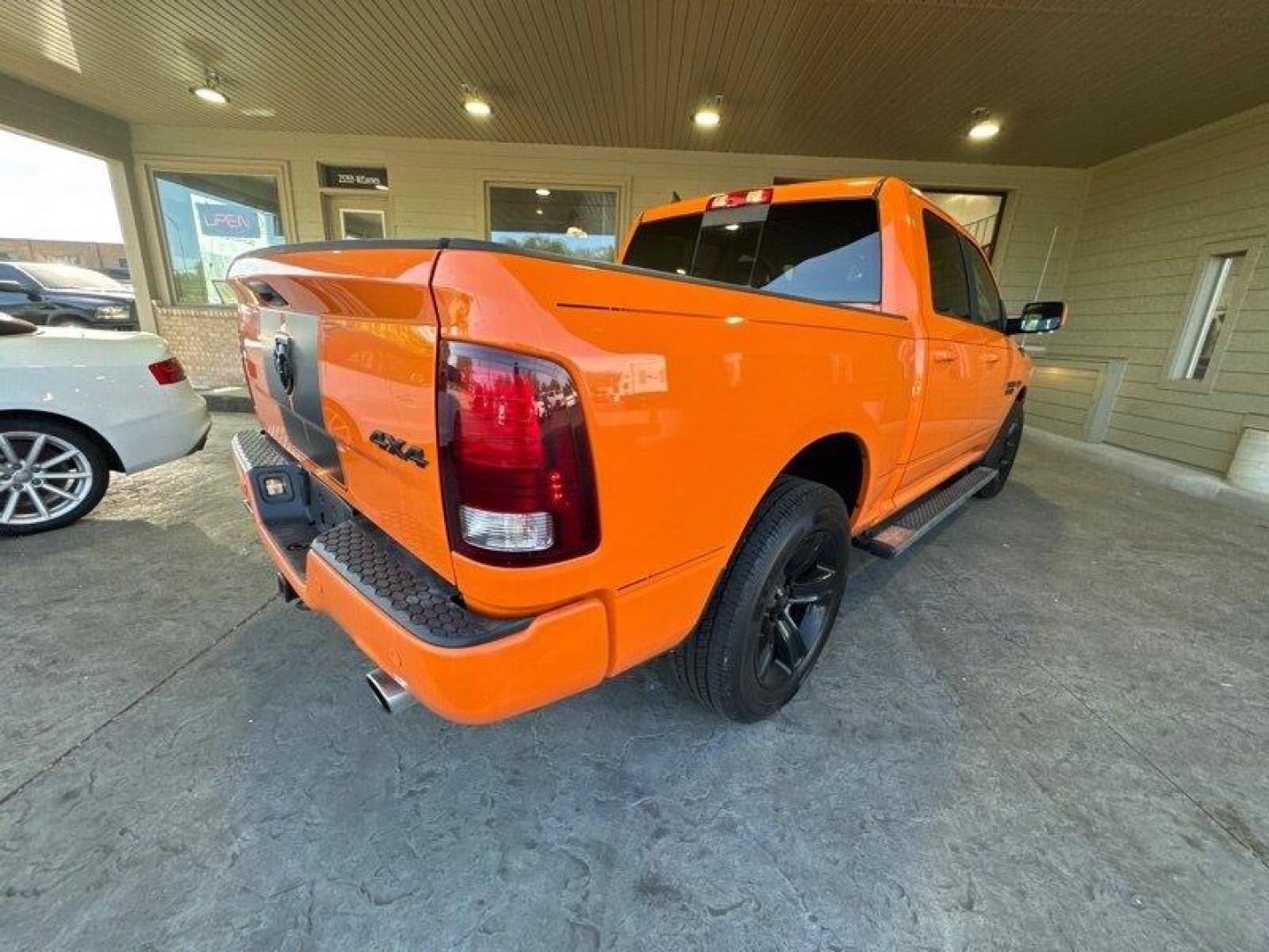 2015 Ignition Orange Clear Coat RAM 1500 Sport (1C6RR7MT9FS) with an HEMI 5.7L V8 395hp 410ft. lbs. engine, Automatic transmission, located at 25355 Eames Street, Channahon, IL, 60410, (815) 467-1807, 41.429108, -88.228432 - Looking for a truck that's got power for days and style to spare? Look no further than the 2015 RAM 1500 Sport! This bad boy is powered by a HEMI 5.7L V8 engine that delivers a whopping 395 horsepower and 410 foot-pounds of torque. That's right, you'll be able to haul just about anything you need wh - Photo#2