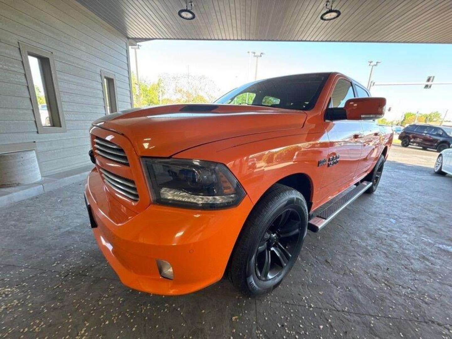 2015 Ignition Orange Clear Coat RAM 1500 Sport (1C6RR7MT9FS) with an HEMI 5.7L V8 395hp 410ft. lbs. engine, Automatic transmission, located at 25355 Eames Street, Channahon, IL, 60410, (815) 467-1807, 41.429108, -88.228432 - Looking for a truck that's got power for days and style to spare? Look no further than the 2015 RAM 1500 Sport! This bad boy is powered by a HEMI 5.7L V8 engine that delivers a whopping 395 horsepower and 410 foot-pounds of torque. That's right, you'll be able to haul just about anything you need wh - Photo#5