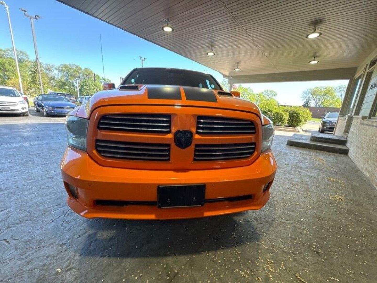 2015 Ignition Orange Clear Coat RAM 1500 Sport (1C6RR7MT9FS) with an HEMI 5.7L V8 395hp 410ft. lbs. engine, Automatic transmission, located at 25355 Eames Street, Channahon, IL, 60410, (815) 467-1807, 41.429108, -88.228432 - Looking for a truck that's got power for days and style to spare? Look no further than the 2015 RAM 1500 Sport! This bad boy is powered by a HEMI 5.7L V8 engine that delivers a whopping 395 horsepower and 410 foot-pounds of torque. That's right, you'll be able to haul just about anything you need wh - Photo#7