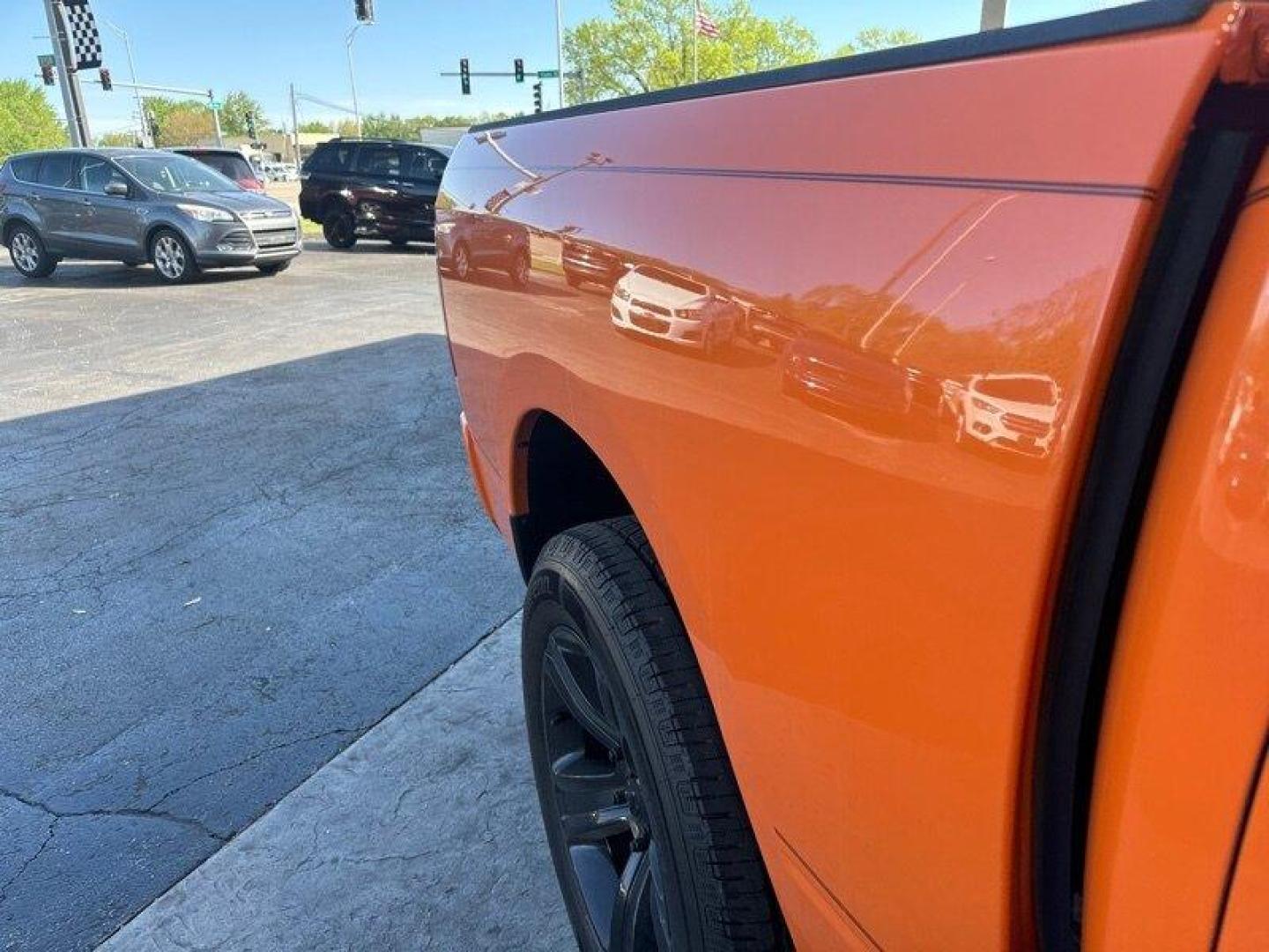 2015 Ignition Orange Clear Coat RAM 1500 Sport (1C6RR7MT9FS) with an HEMI 5.7L V8 395hp 410ft. lbs. engine, Automatic transmission, located at 25355 Eames Street, Channahon, IL, 60410, (815) 467-1807, 41.429108, -88.228432 - Looking for a truck that's got power for days and style to spare? Look no further than the 2015 RAM 1500 Sport! This bad boy is powered by a HEMI 5.7L V8 engine that delivers a whopping 395 horsepower and 410 foot-pounds of torque. That's right, you'll be able to haul just about anything you need wh - Photo#9