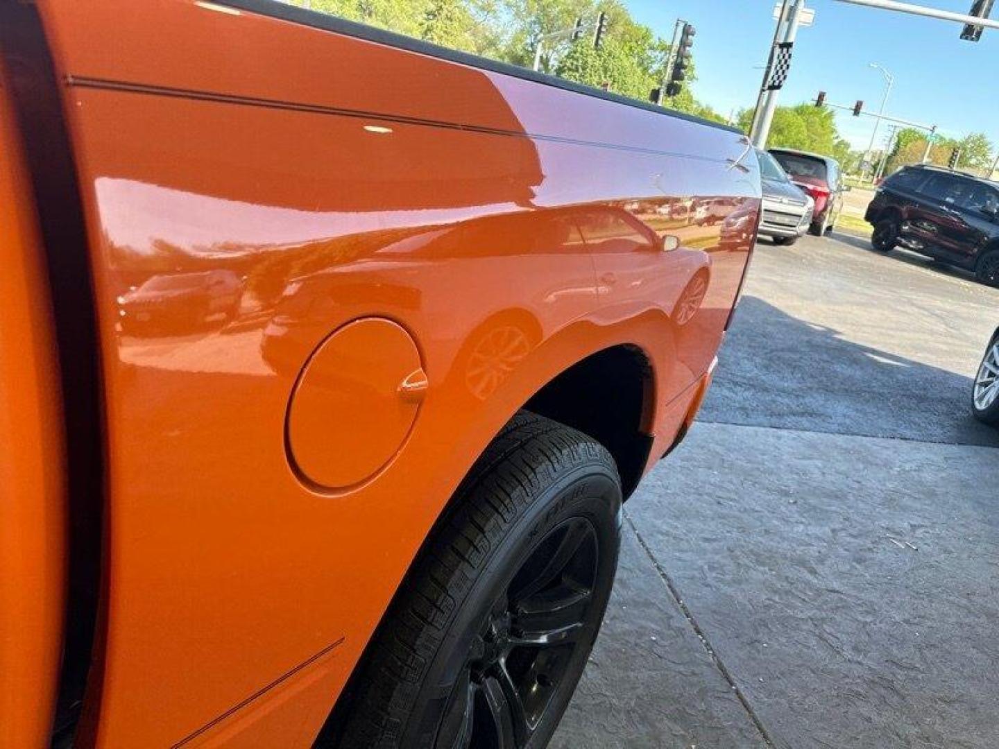 2015 Ignition Orange Clear Coat RAM 1500 Sport (1C6RR7MT9FS) with an HEMI 5.7L V8 395hp 410ft. lbs. engine, Automatic transmission, located at 25355 Eames Street, Channahon, IL, 60410, (815) 467-1807, 41.429108, -88.228432 - Looking for a truck that's got power for days and style to spare? Look no further than the 2015 RAM 1500 Sport! This bad boy is powered by a HEMI 5.7L V8 engine that delivers a whopping 395 horsepower and 410 foot-pounds of torque. That's right, you'll be able to haul just about anything you need wh - Photo#10