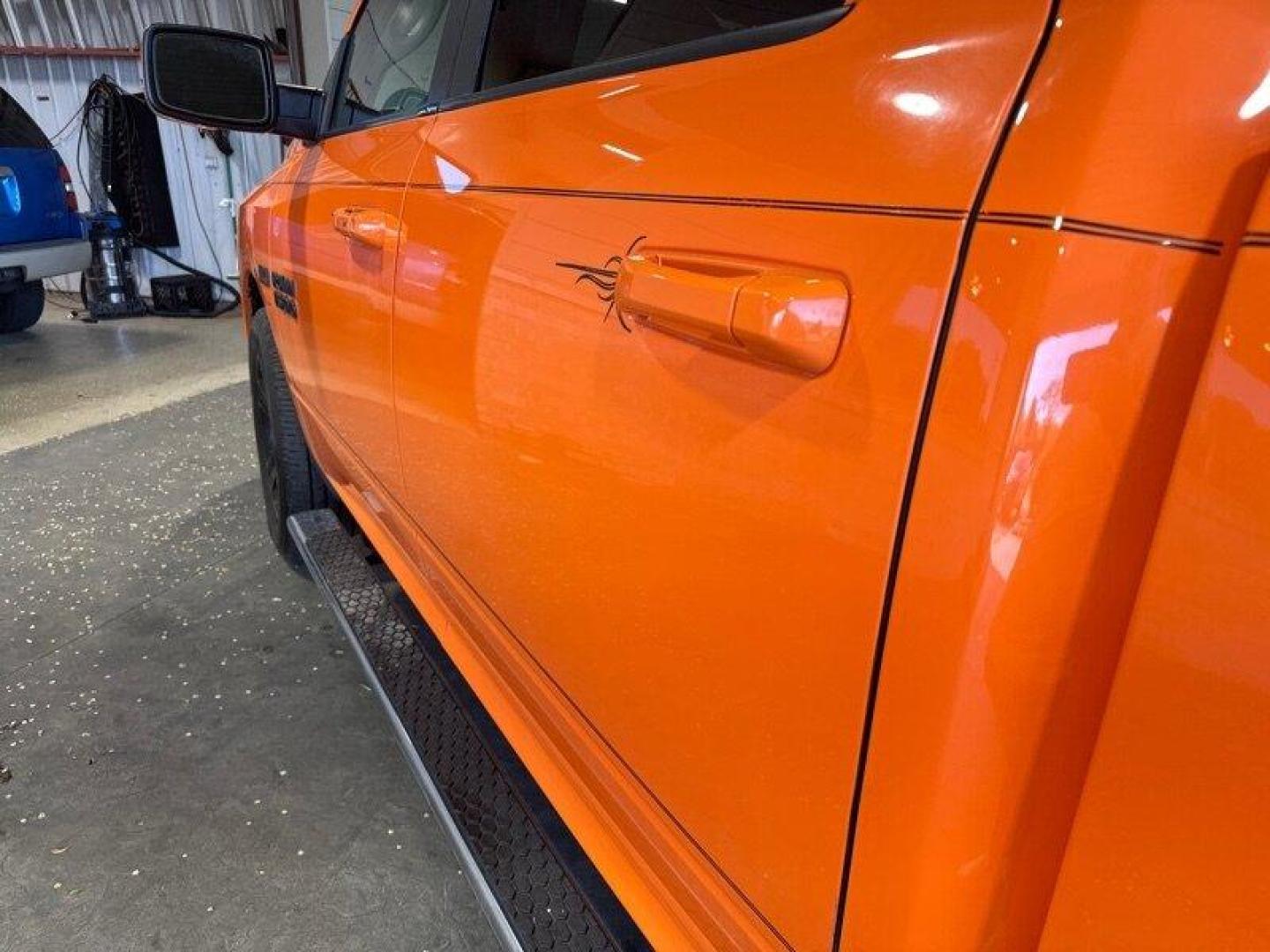 2015 Ignition Orange Clear Coat RAM 1500 Sport (1C6RR7MT9FS) with an HEMI 5.7L V8 395hp 410ft. lbs. engine, Automatic transmission, located at 25355 Eames Street, Channahon, IL, 60410, (815) 467-1807, 41.429108, -88.228432 - Looking for a truck that's got power for days and style to spare? Look no further than the 2015 RAM 1500 Sport! This bad boy is powered by a HEMI 5.7L V8 engine that delivers a whopping 395 horsepower and 410 foot-pounds of torque. That's right, you'll be able to haul just about anything you need wh - Photo#11