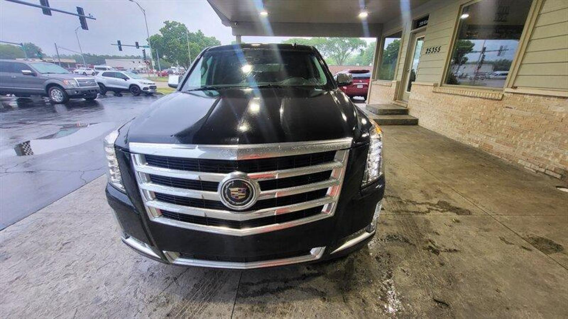 2015 Black Raven Cadillac Escalade ESV Premium (1GYS4JKJ1FR) with an EcoTec3 6.2L V8 420hp 460ft. lbs. engine, Automatic transmission, located at 25355 Eames Street, Channahon, IL, 60410, (815) 467-1807, 41.429108, -88.228432 - Ladies and gentlemen, buckle up and get ready to hear about the 2015 Cadillac Escalade ESV Premium! This luxurious SUV is powered by a beast of an engine, an EcoTec3 6.2L V8 that churns out 420 horsepower and 460 foot-pounds of torque. That's enough power to make you feel like you're driving a rocke - Photo#14