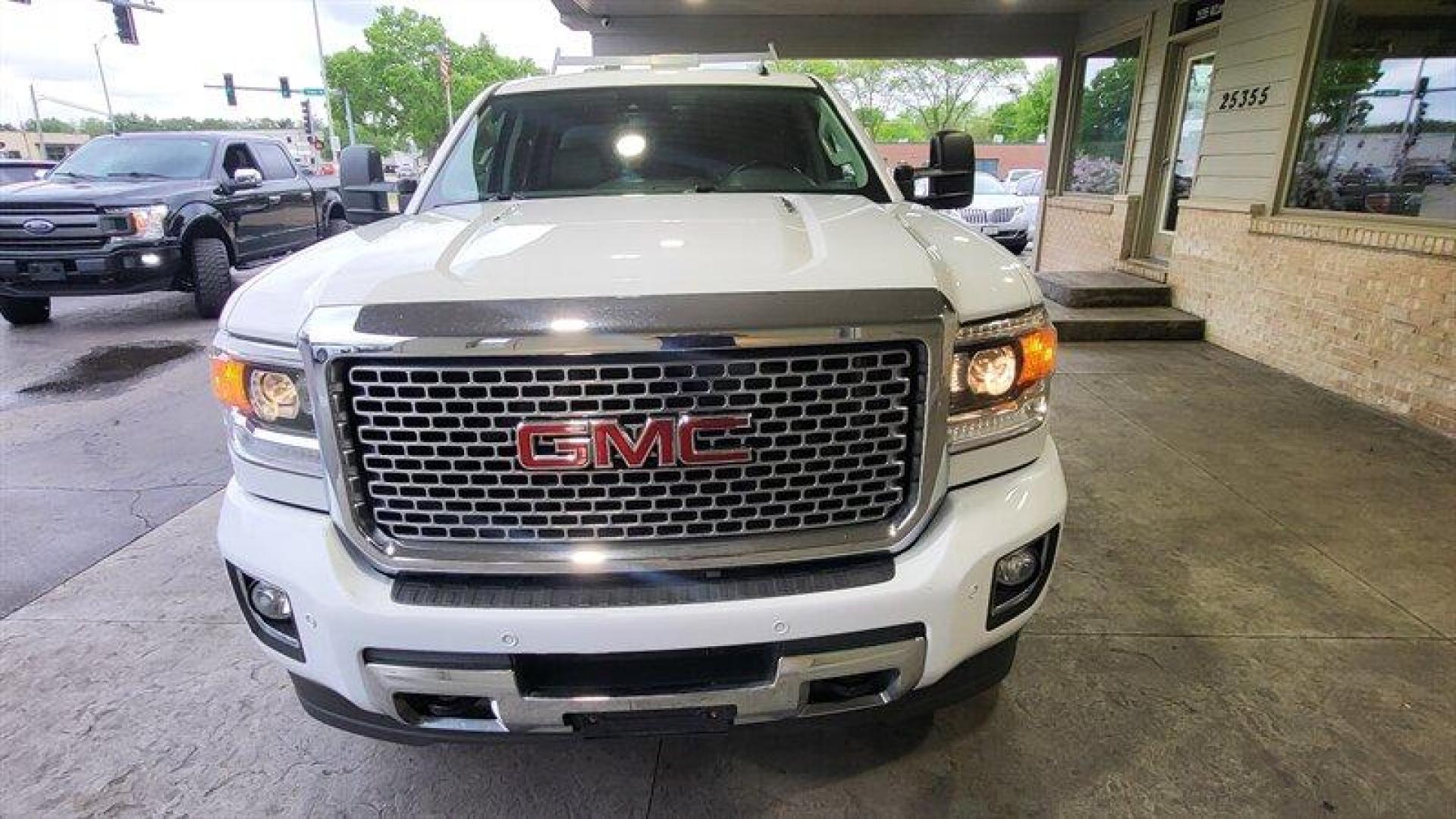 2015 Summit White GMC Sierra 2500 Denali (1GT120E83FF) with an Duramax 6.6L Diesel Turbo V8 397hp 765ft. lbs. engine, Automatic transmission, located at 25355 Eames Street, Channahon, IL, 60410, (815) 467-1807, 41.429108, -88.228432 - Oh honey, let me tell you about the 2015 GMC Sierra 2500 Denali. This baby is powered by a Duramax 6.6L Diesel Turbo V8 engine that's just begging to hit the open road. With 397 horsepower and a whopping 765ft. lbs. of torque, you'll be leaving all those slowpokes in the dust. But let's talk about - Photo#13